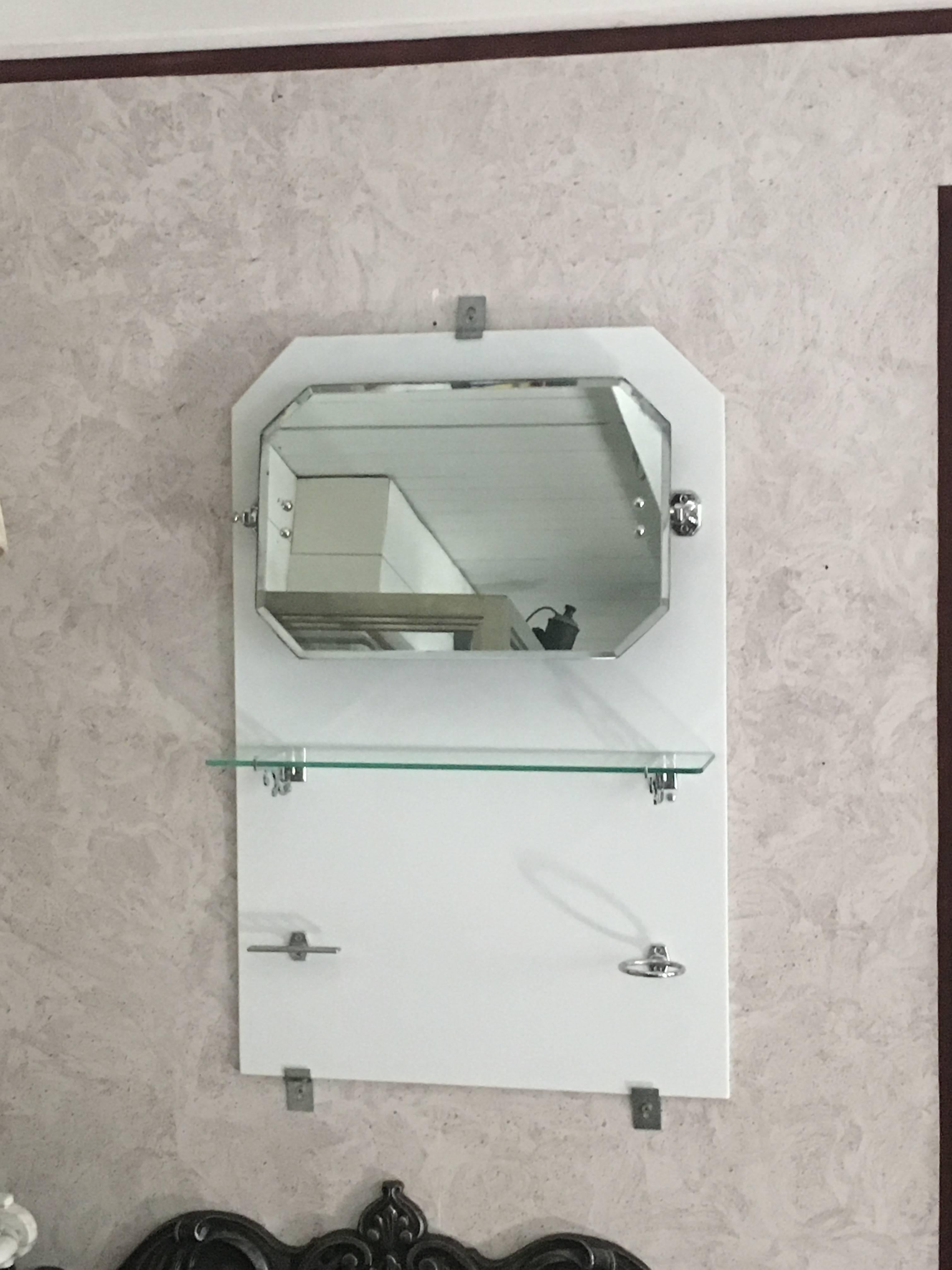 French bathroom adjustable mirror with shelf and accessories from 1920s.
