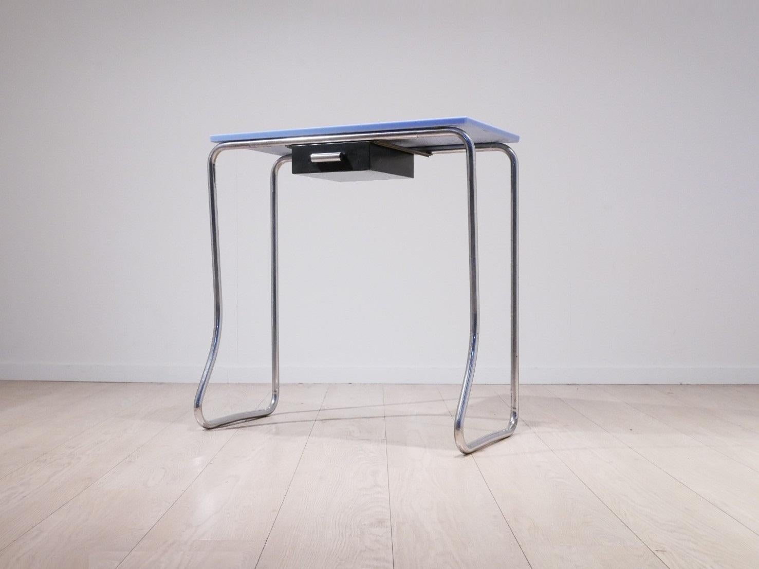 Modernist hallway console from France, tubular chrome structure matched with black painted metal drawer and heavy 2cm thick blue opaline glass top.
Chips on the top - see pictures.