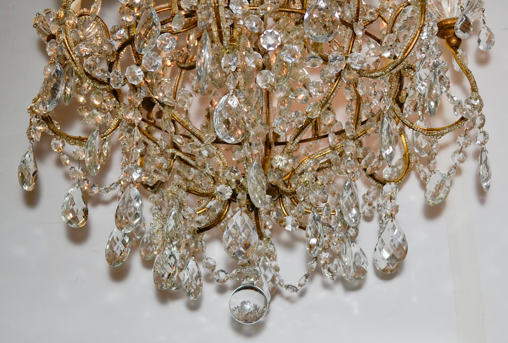 Delightful antique French beaded crystal 8-light chandelier.