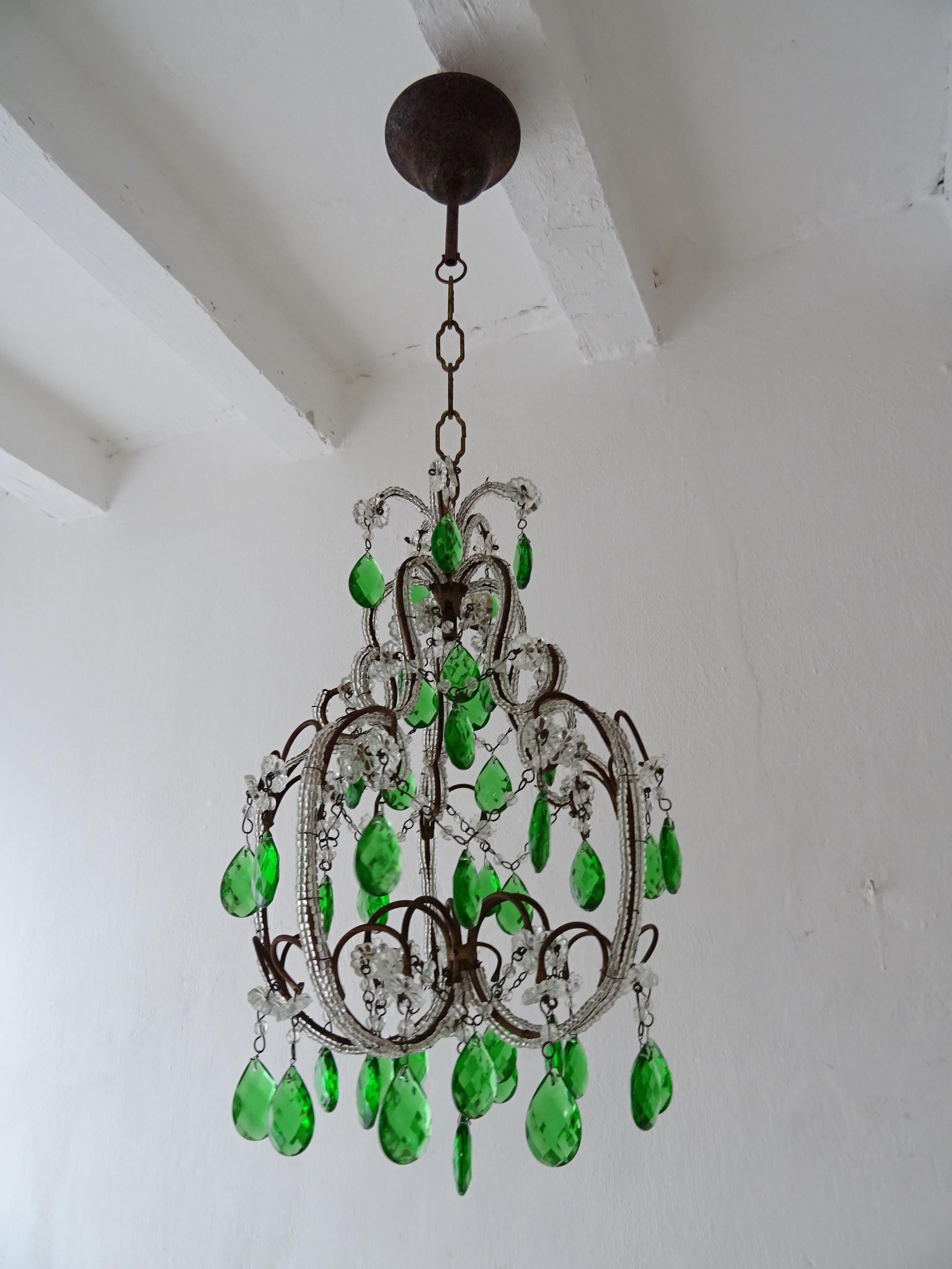 Housing one light. Will be newly wired with a certified US UL socket for the USA or appropriate socket for all other countries and ready to hang. Rare emerald green crystal prisms. Beaded throughout with florets. Adding another 12 inches of original