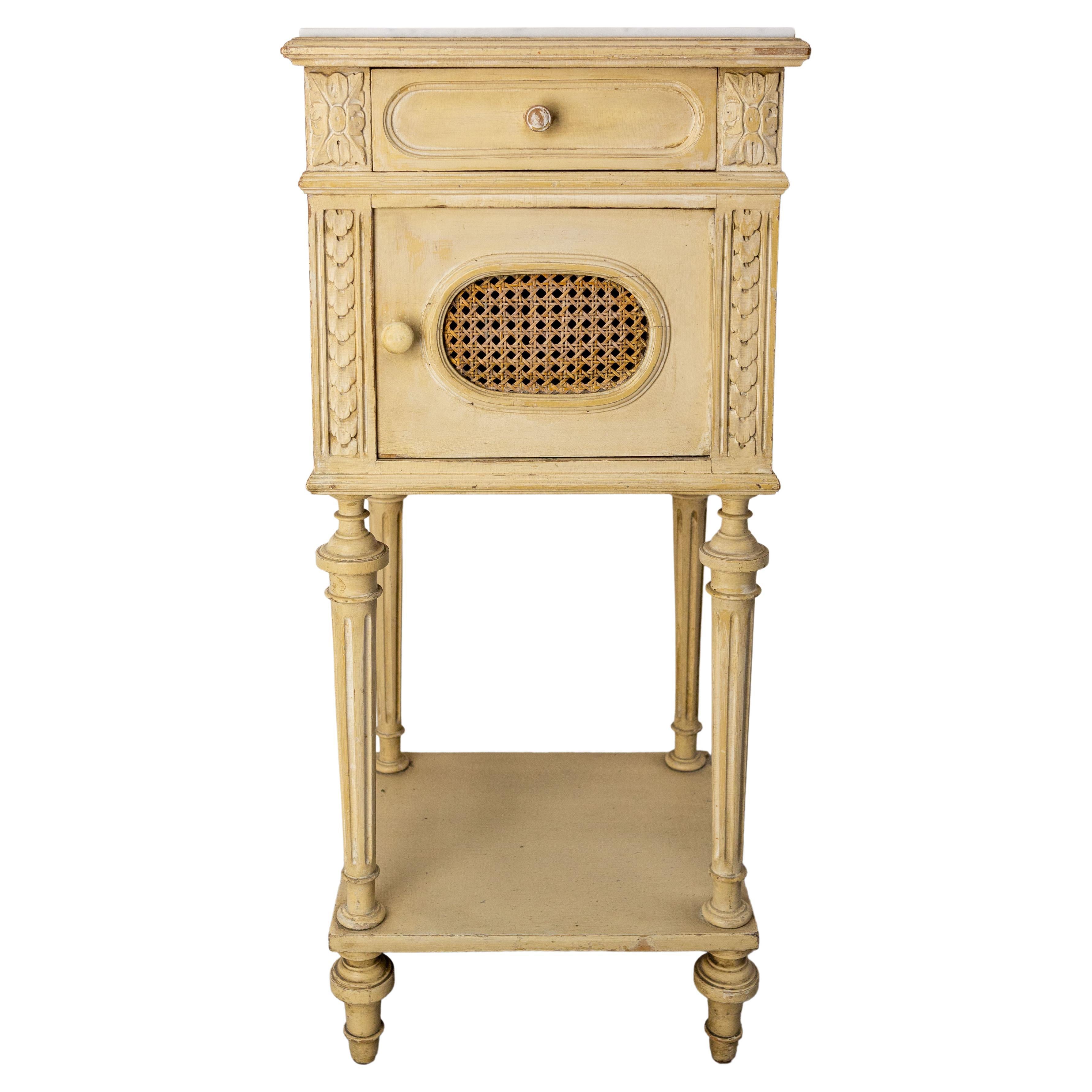French Bedside Table Patinated Wood, Marble Top & Cane Door Louis XVI St, c 1900 For Sale