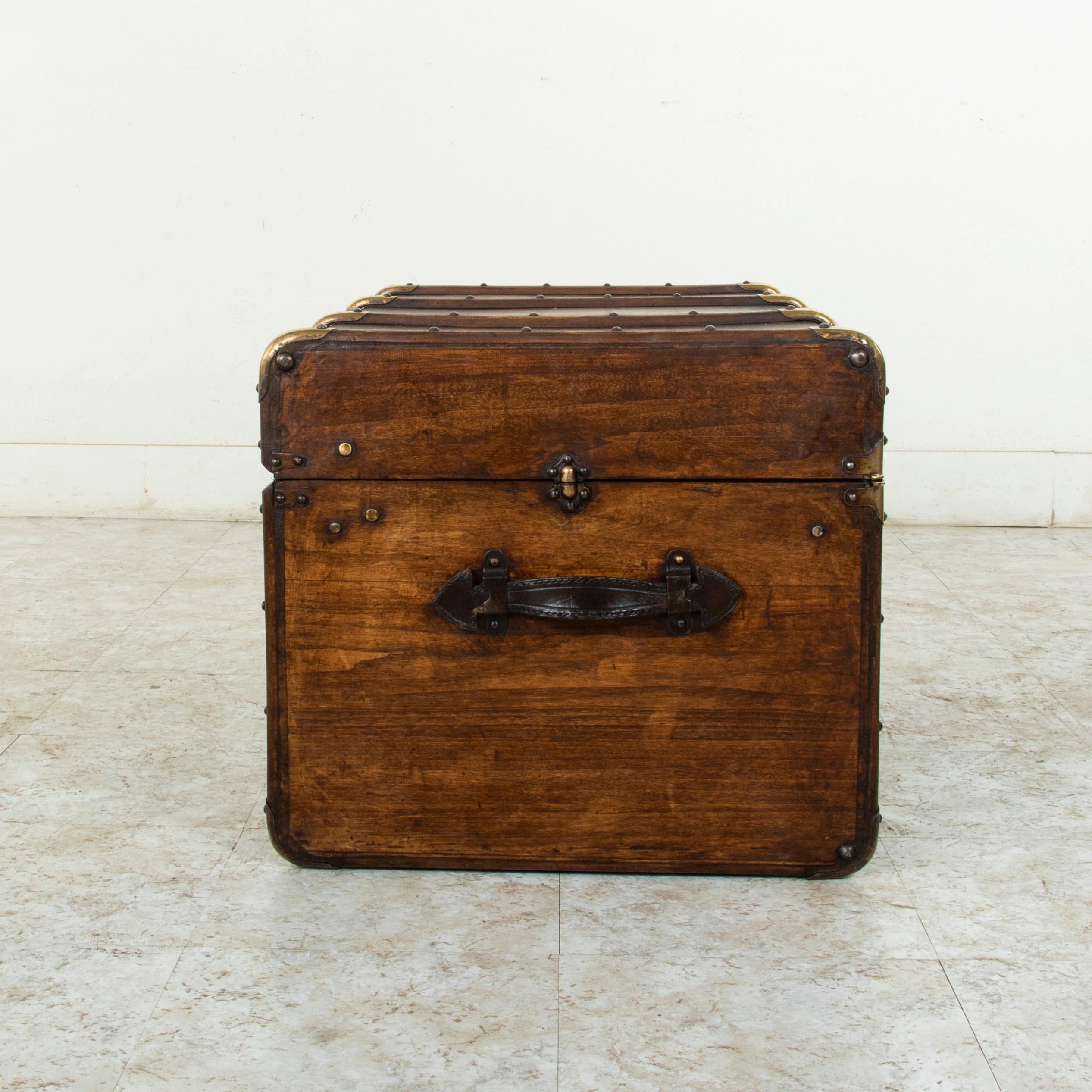 Early 20th Century French Beechwood Trunk with Runners Brass Detailing and Leather Handles