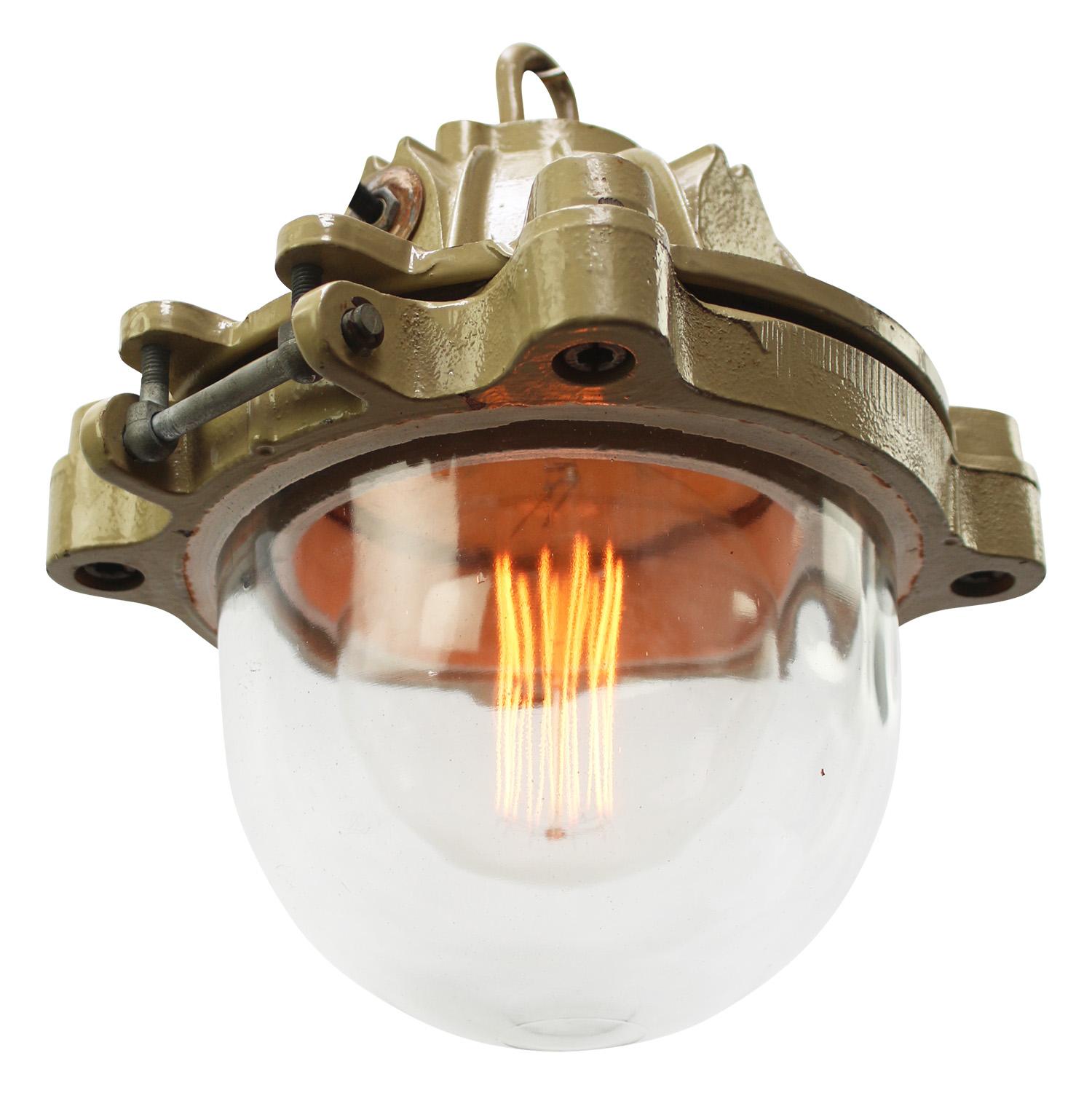 French industrial hanging lamp by Mapelec Amiens. 1966
Brown / Beige cast iron with cage
clear glass

Heavy!

Weight: 13.80 kg / 30.4 lb

Priced per individual item. All lamps have been made suitable by international standards for incandescent light
