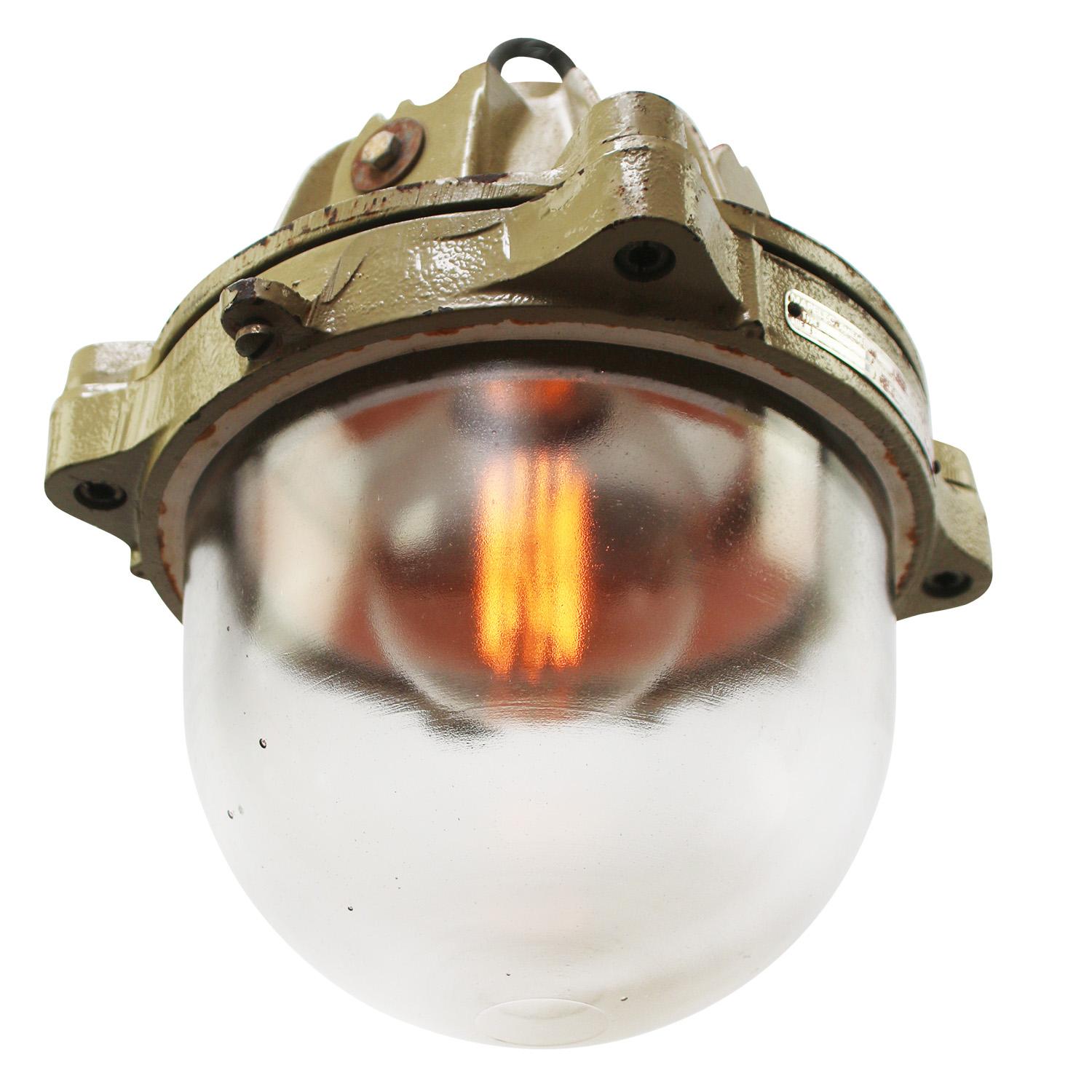 French industrial hanging lamp by Mapelec Amiens. 1977
Brown / Beige cast iron with clear glass

Heavy!

Weight: 22.00 kg / 48.5 lb

Priced per individual item. All lamps have been made suitable by international standards for incandescent light