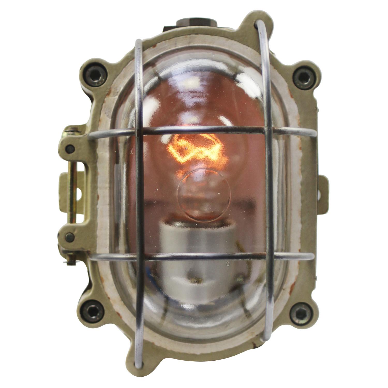 Industrial wall or ceiling lamp made by Mapelec, Amiens, France
Brown / Beige cast iron, clear glass

Weight: 5.70 kg / 12.6 lb

Priced per individual item. All lamps have been made suitable by international standards for incandescent light bulbs,