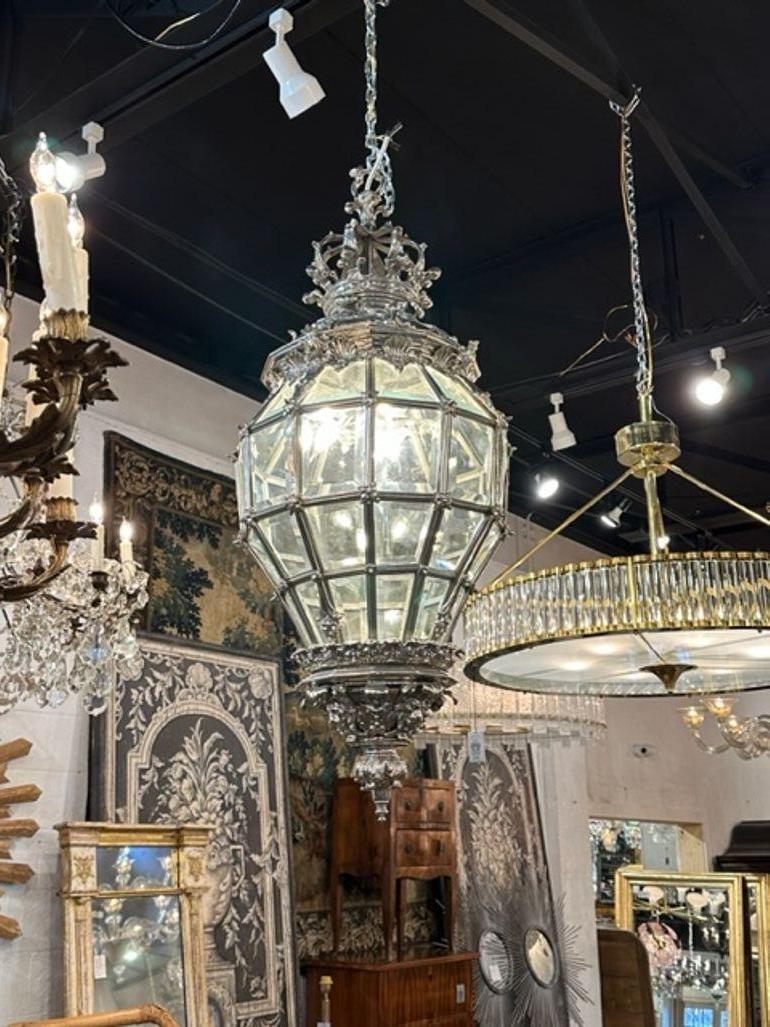 Outstanding French belle epoch silver over bronze lantern. circa 1890. The chandelier has been professionally rewired, comes with matching chain and canopy. It is ready to hang!