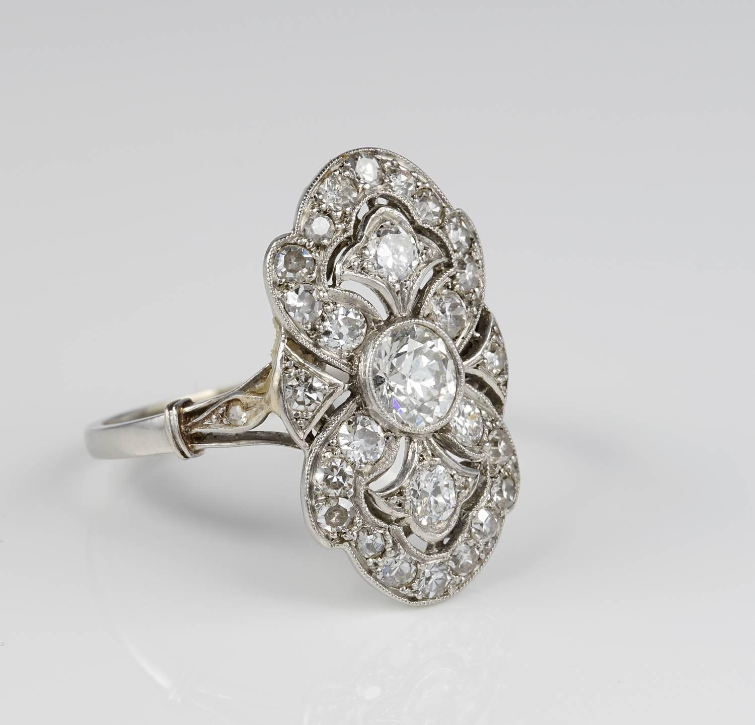 Extraordinary French example of Belle Epoque period panel ring, 1900 ca.
Bearing French hallmarks, all solid Platinum.
Exquisitely designed in an intricate flat panel overwhelmed by Diamonds.
Centre Diamond is .65 Ct with more and more Diamonds