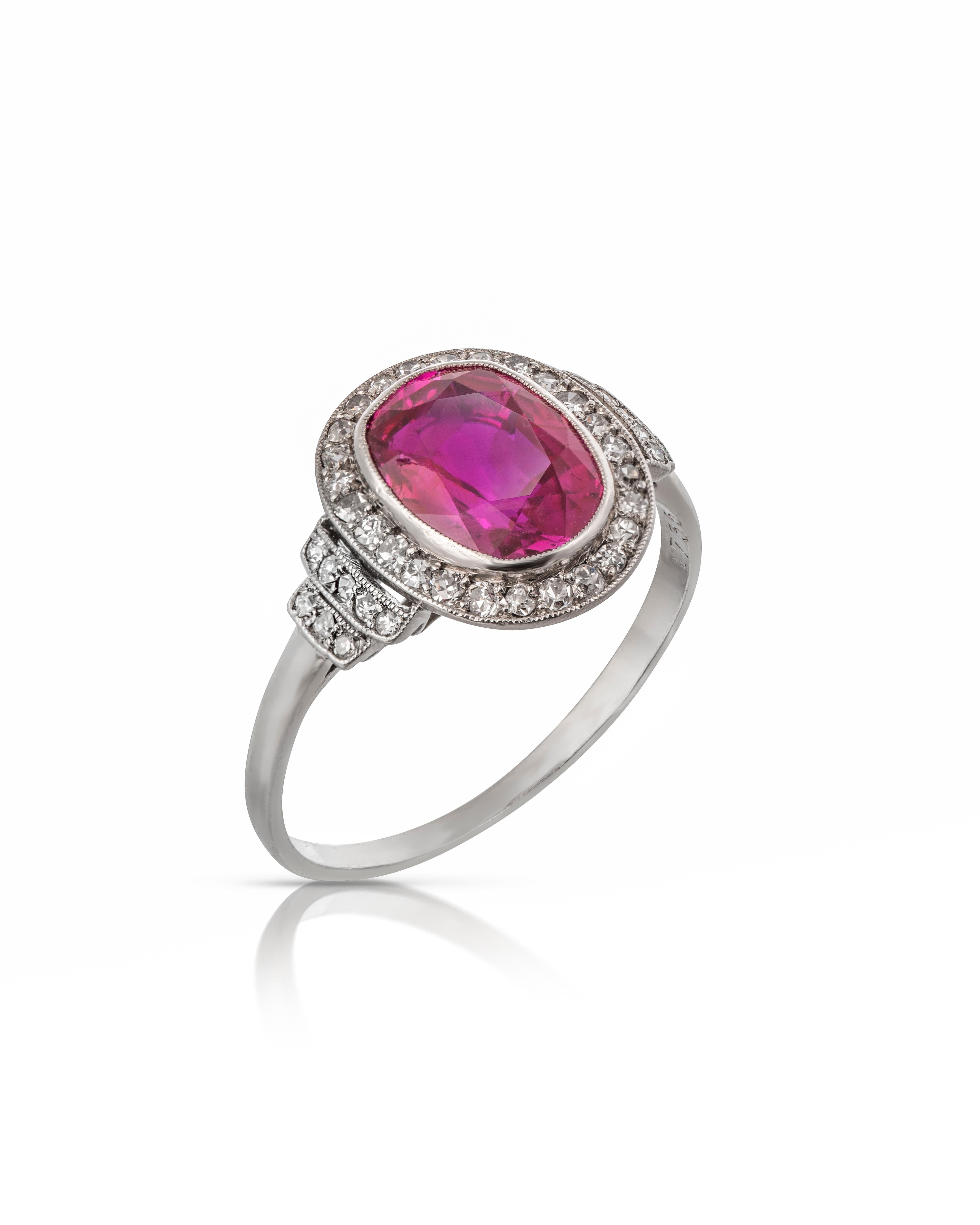 French Belle Epoque 3 Carat Burma Ruby and Diamond Cluster ring set in Platinum
A stunning French Belle Epoque 3 Carat Burma ruby and diamond cluster ring set in Platinum. The ring centres a certificated natural unheated Burmese ruby of excellent