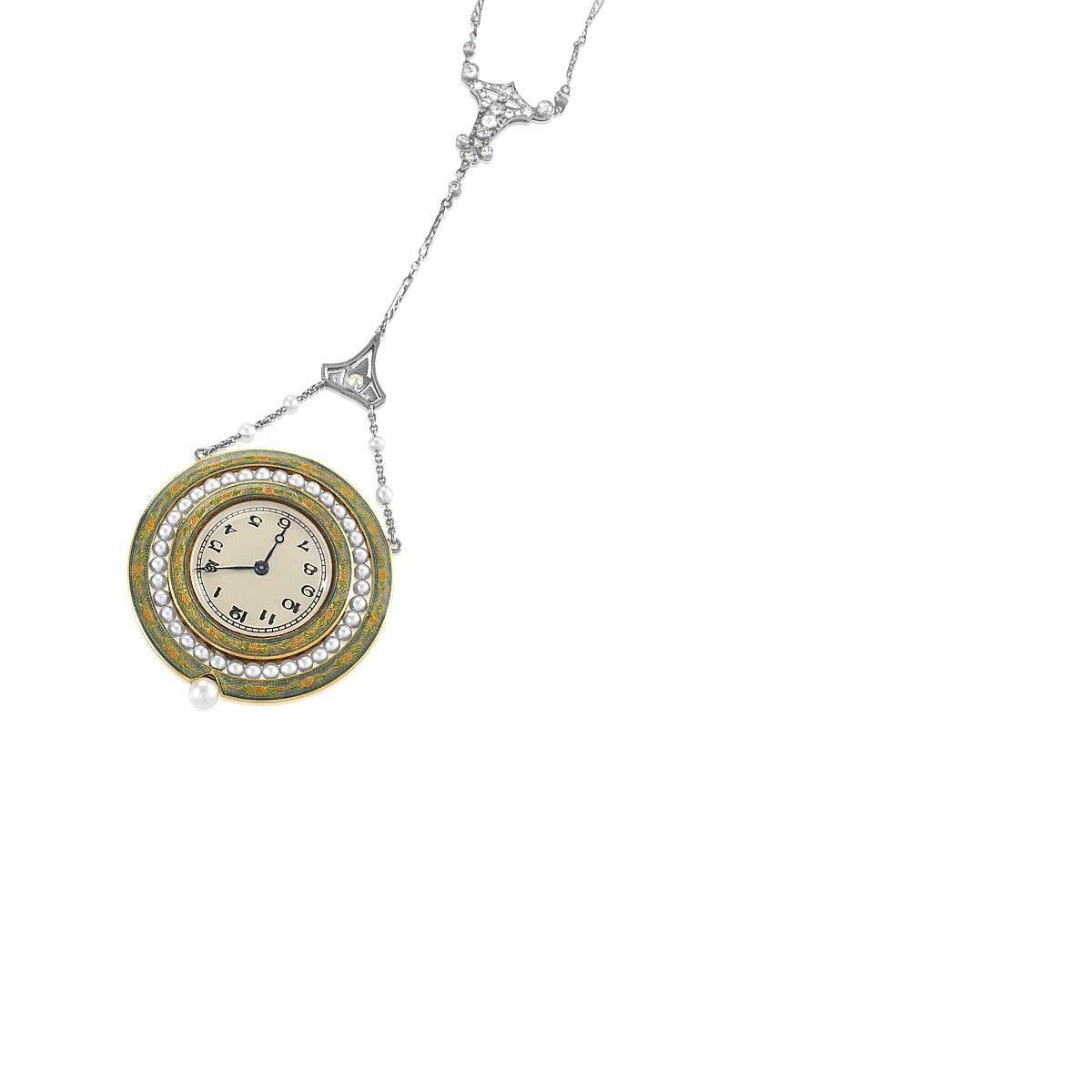 A French Belle Epoque 18 karat gold, platinum, diamond, pearl and Paillet enamel pendant watch necklace.  The pendant watch has 26 old European-cut diamonds with an approximate total weight of 1.05 carats, 70 rose-cut diamonds with an approximate