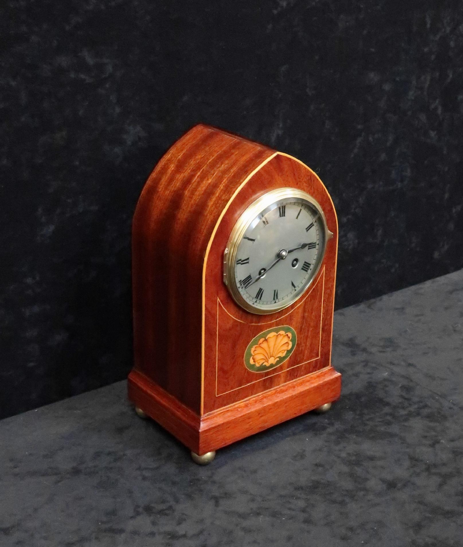 20th Century French Belle Époque Figured Mahogany Mantel Clock with Inlay For Sale