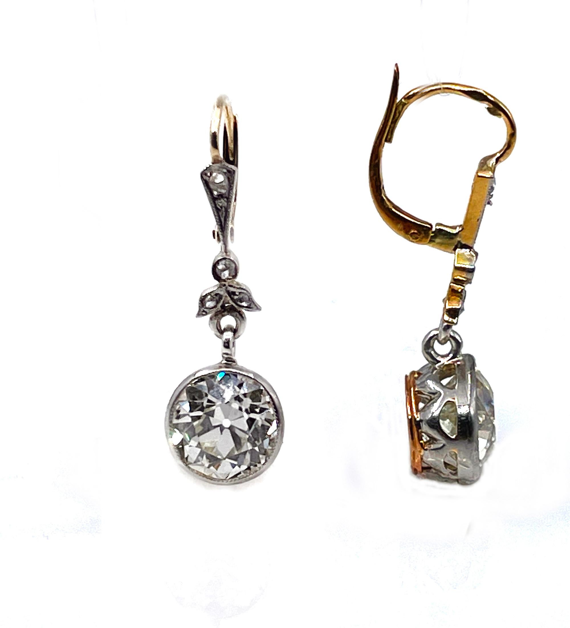 Exquisite pair of French Original Edwardian Era that screams Belle Époque. Most beautiful and unique European jewelry was made during that era right before Art Deco hit the world with it's straight lines!
Bezel Set shimmering Old European cut