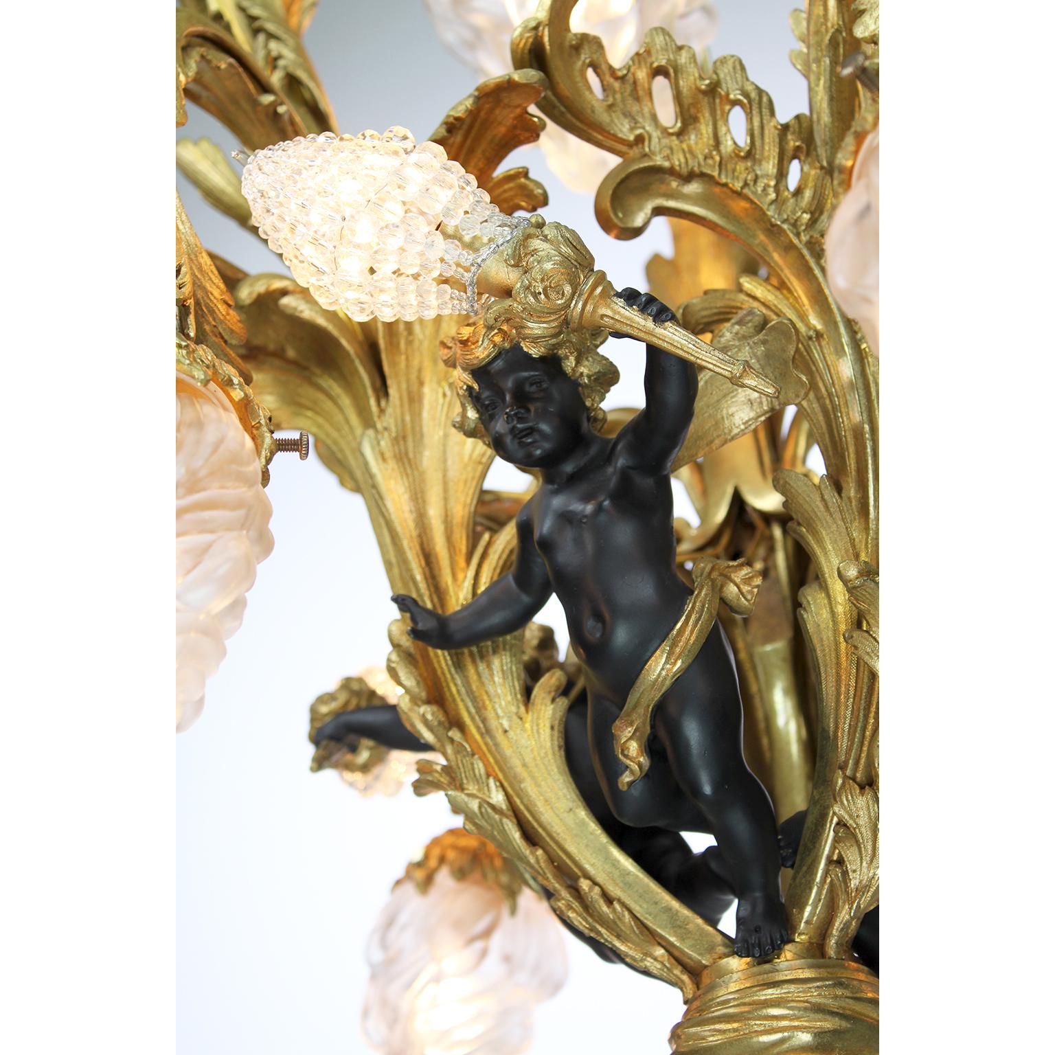 French Belle Époque Gilt Bronze, Patinated Bronze Ten-Light Cherub Chandelier In Good Condition For Sale In Los Angeles, CA