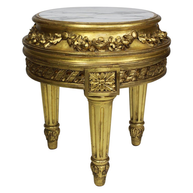 TABLE-GUÉRIDON en bois sculpté et doré à quatre pieds ancien - Antiquités