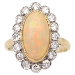 French Belle Epoque opal diamond cluster ring in 18k gold and platinum