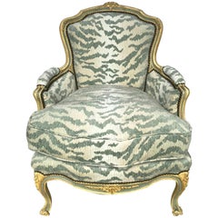 French Bergère Chair, Carved and Painted in Ivory and Celadon Newly Upholstered