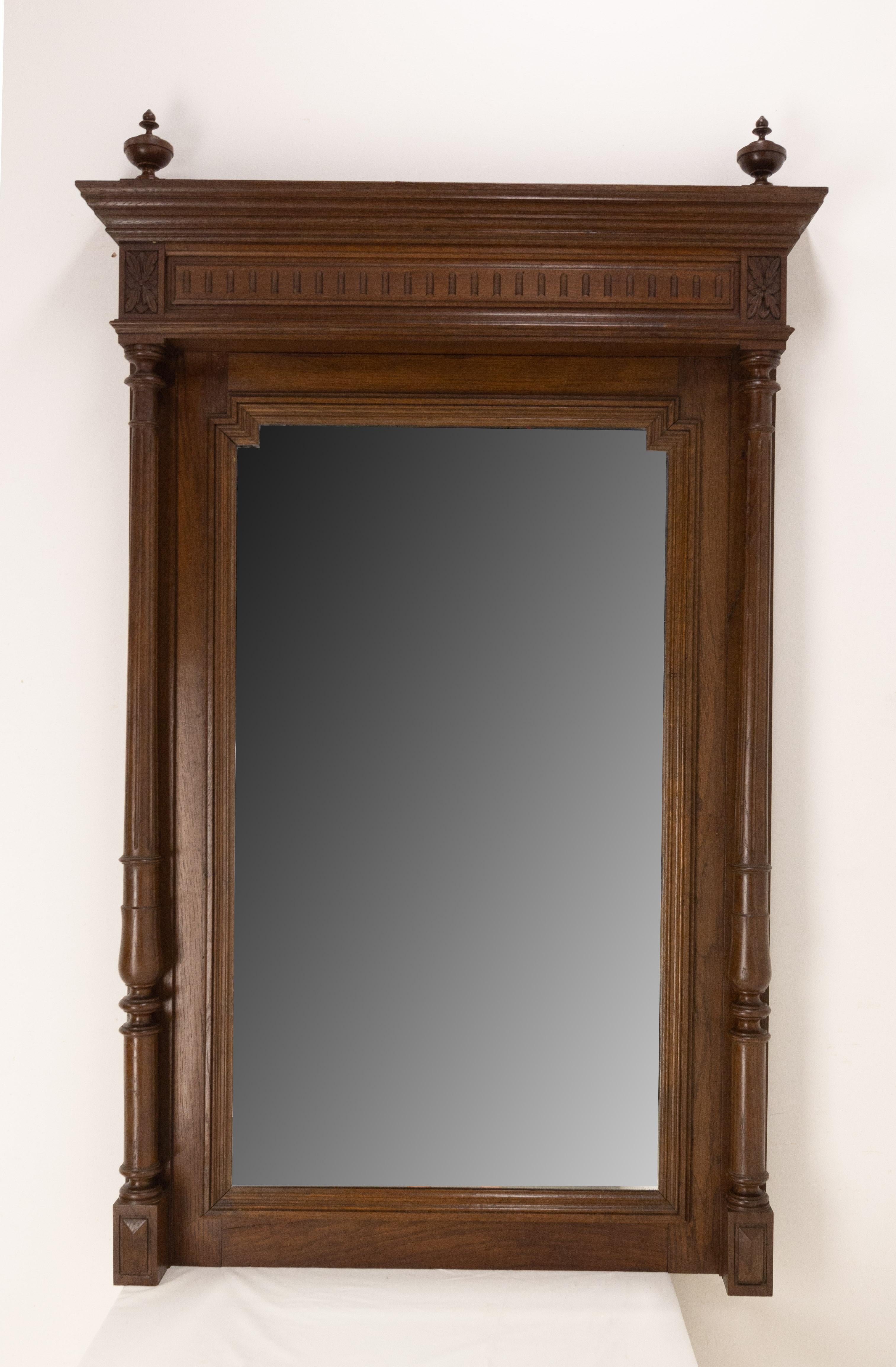 Late 19th century French Mirror with oak frame.
Little columns frame the mirror, Louis XVI style
Beveled mirror.
Good furniture for an entry or for a spacious room.
Good antique condition solid and sound with minor signs of age and