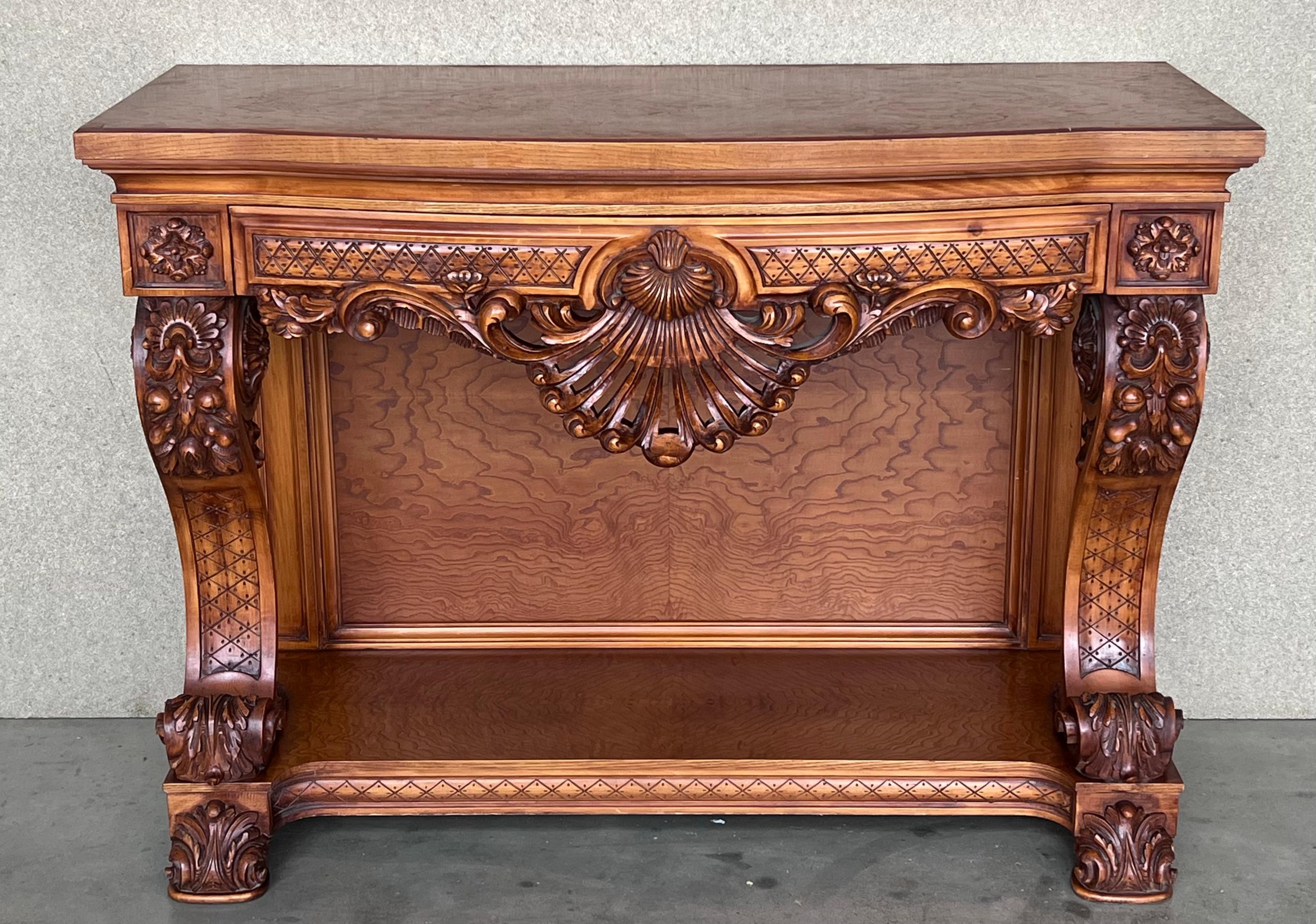 A Scandinavian mahogany early 19th century Empire table or console. This antique Swedish Biedermeier piece has a drawer with its original working key included and a bottom shelf resting on rounded feet. It is probably made in the Baltic area of