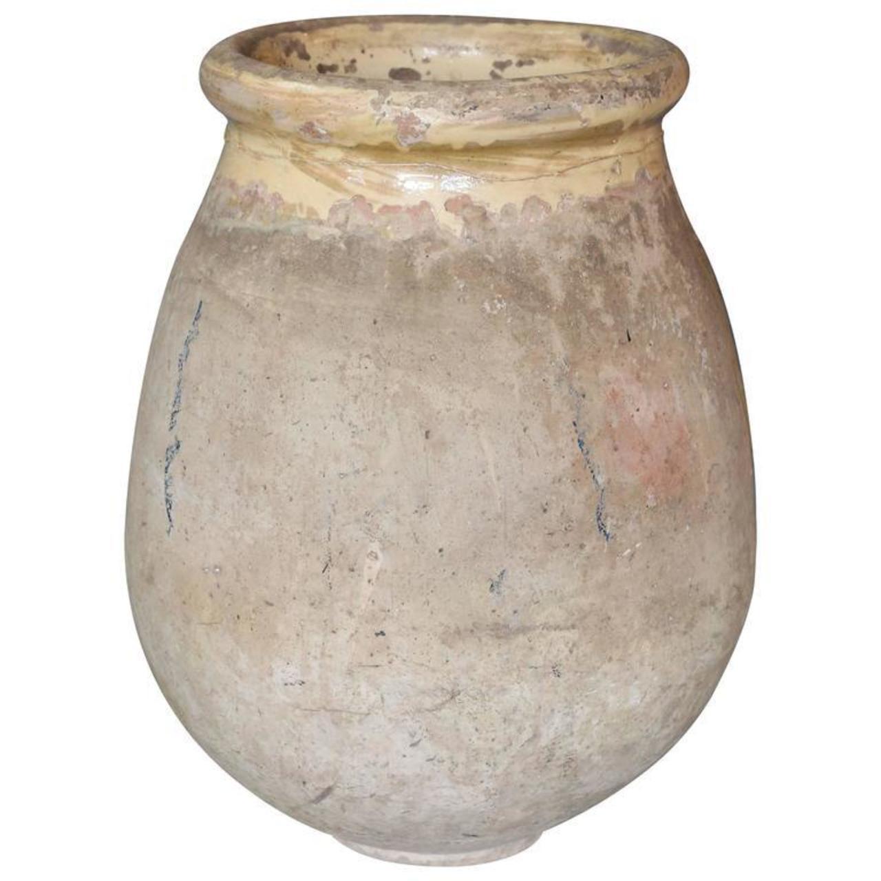 French Biot jar, mid-19th century terracotta jar in traditional Biot shape with yellow-glazed rim and interior.