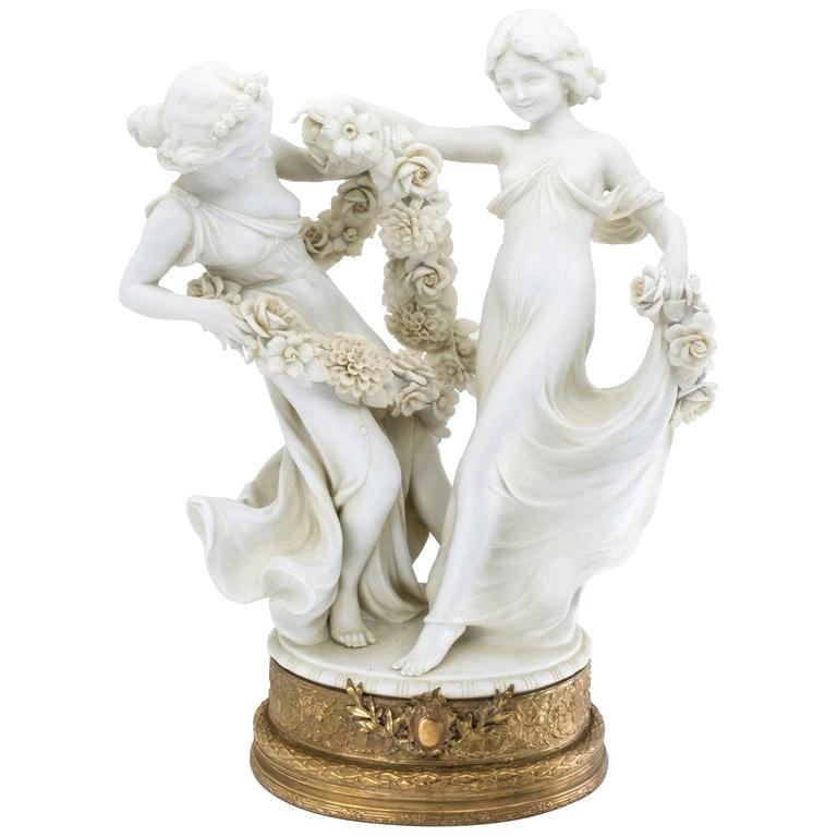 French Bisque Figure of Two Girls Holding Flowers, 19th Century For Sale