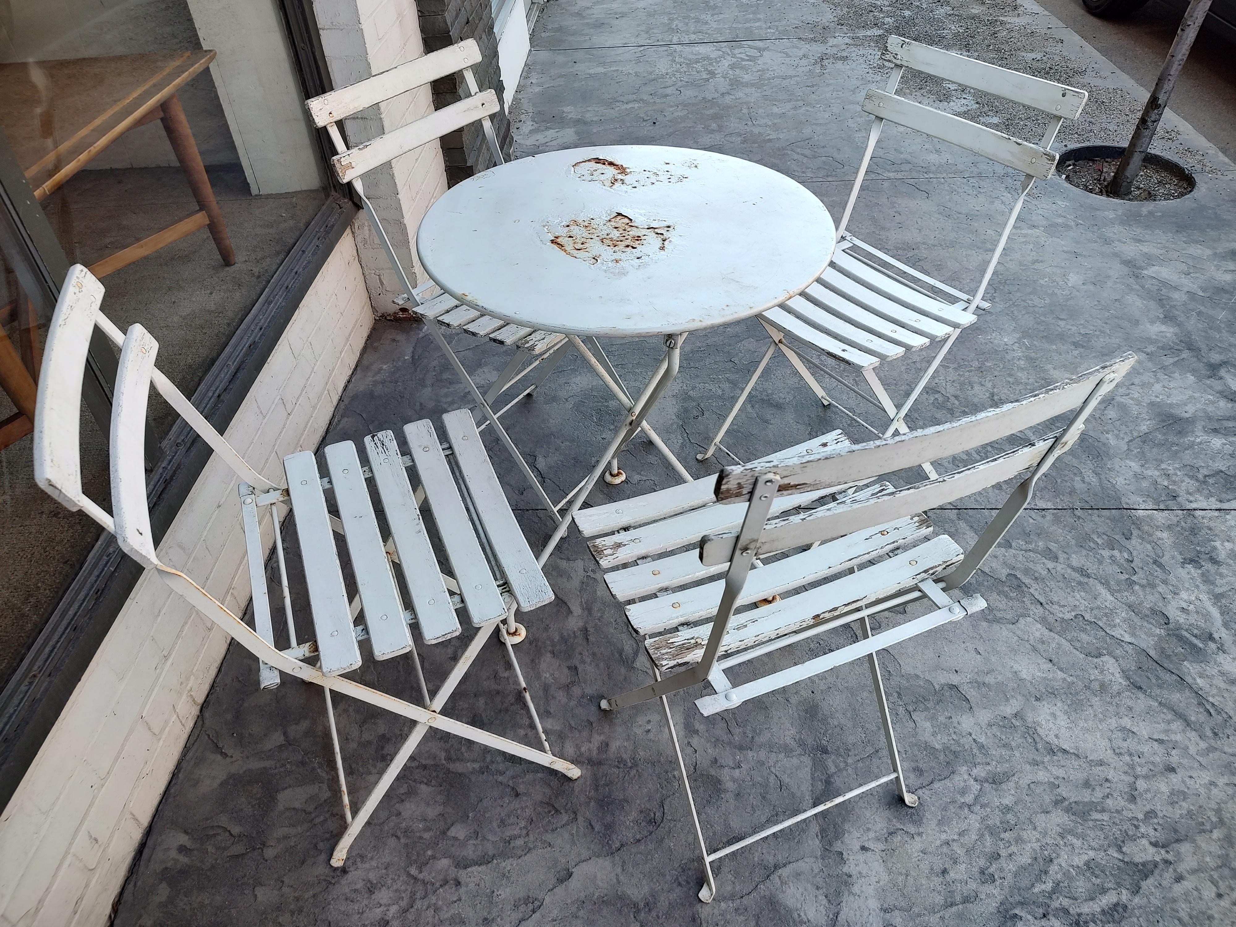 French Bistro 5 Piece Set, 4 Folding Slatted Chairs with an Iron Table In Good Condition In Port Jervis, NY