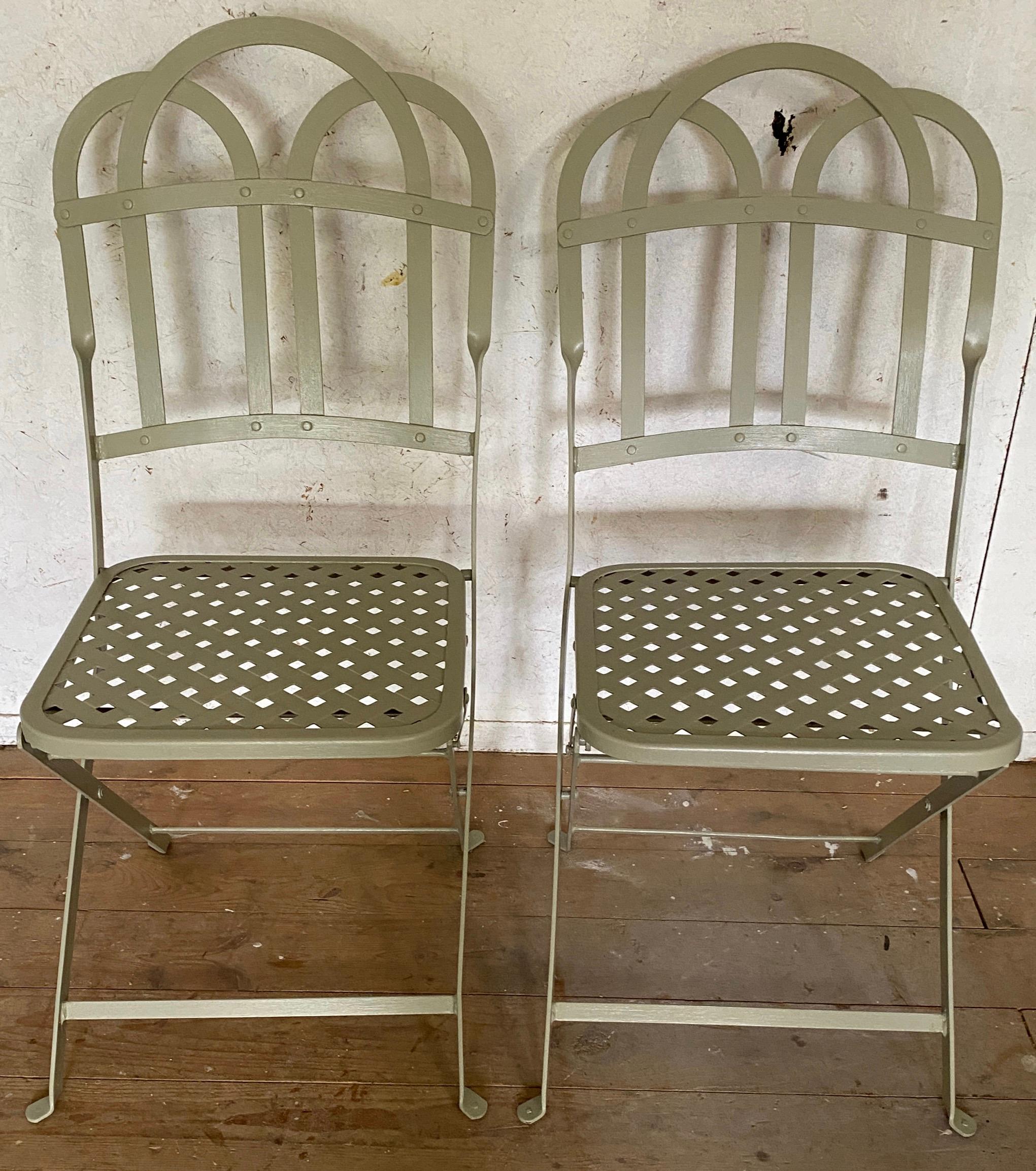 French cafe round bistro table with a pair of matching chairs are perfect for the porch, patio or garden. Use the metal garden chairs and table set for regular dining or for spare table and chairs. All three pieces fold up easily for handy