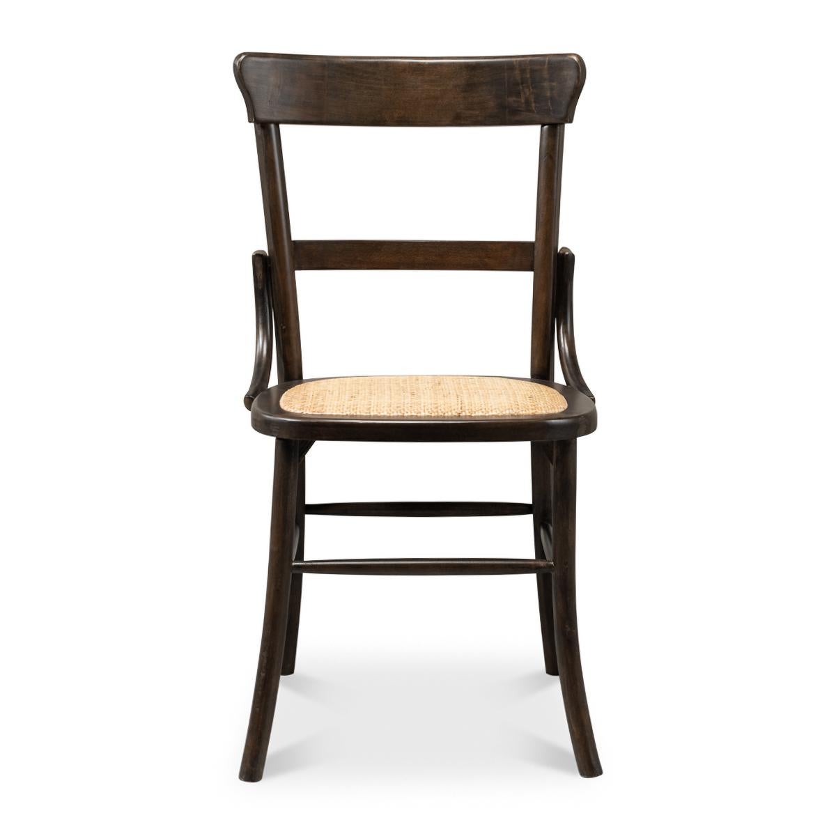 French Bistro Dining Side Chair with a stained maple frame and a rattan insert seat. It speaks to French cafes and a time gone by while constructed and perfectly suited for today's modern living.

Dimensions: 20