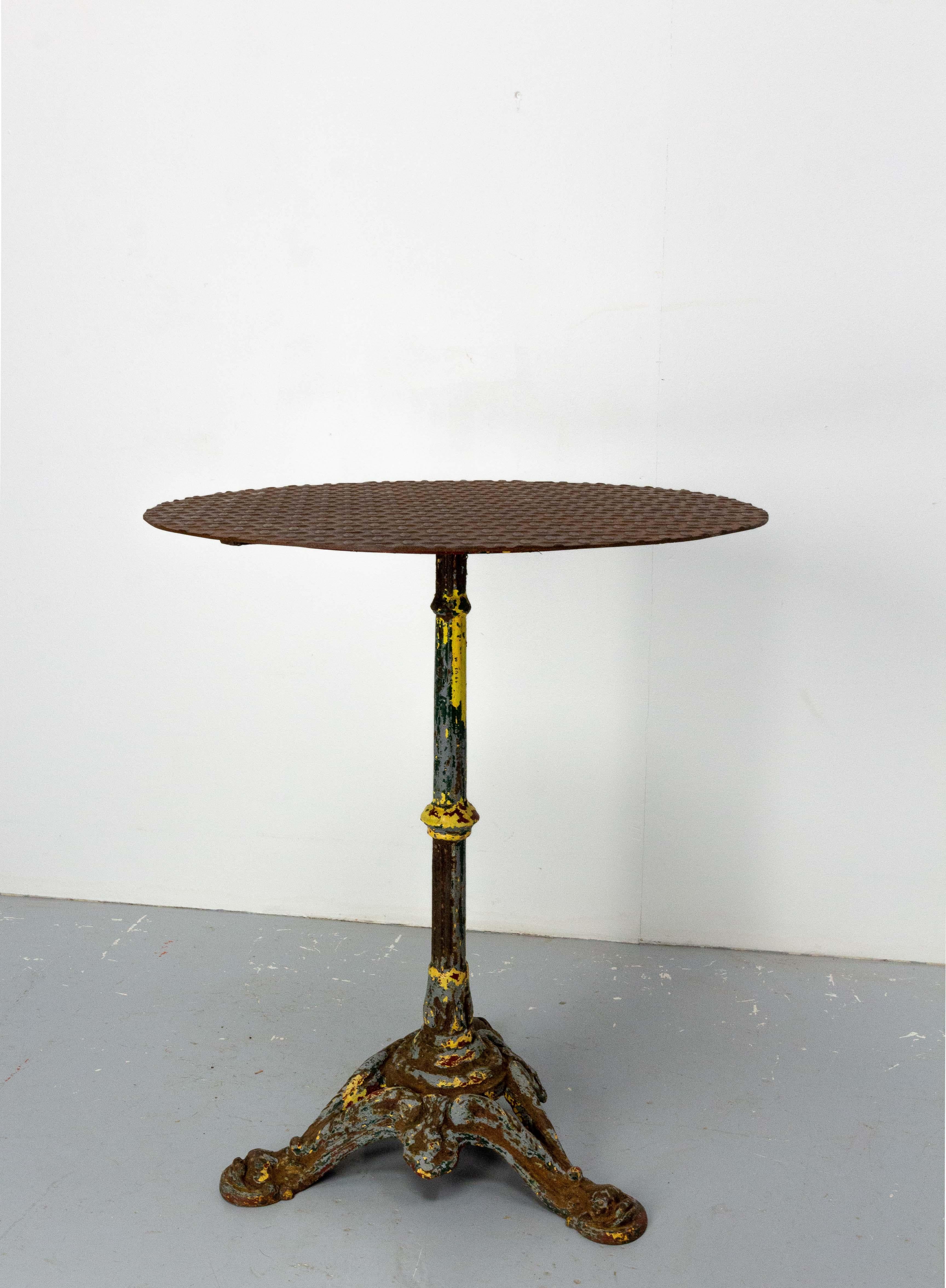 Bistro tables with metal top and wrought iron foot, French, late 19th century
This table is a composition of the seventies years made with a authentic bistro table foot from Paris and an industrial metal plate.
Good antique condition with general