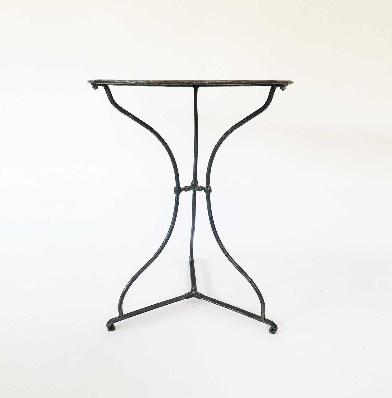 French bistro table, made of iron, wonderful aged patina, circa 1920.
