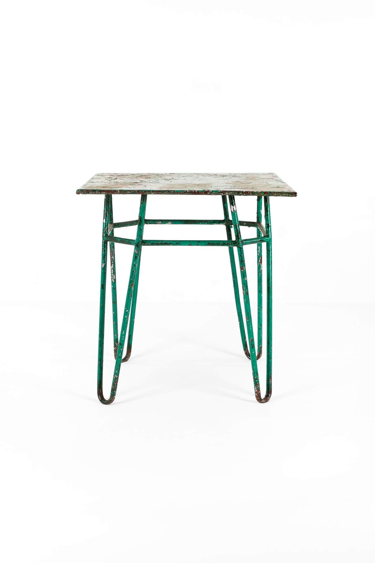 A fabulous continental tubular bistro table in original vibrant green paint.

The smooth square top rests on double tubular corner supports, with high stretchers beneath.

A superb item of original design, perfect for both home and garden