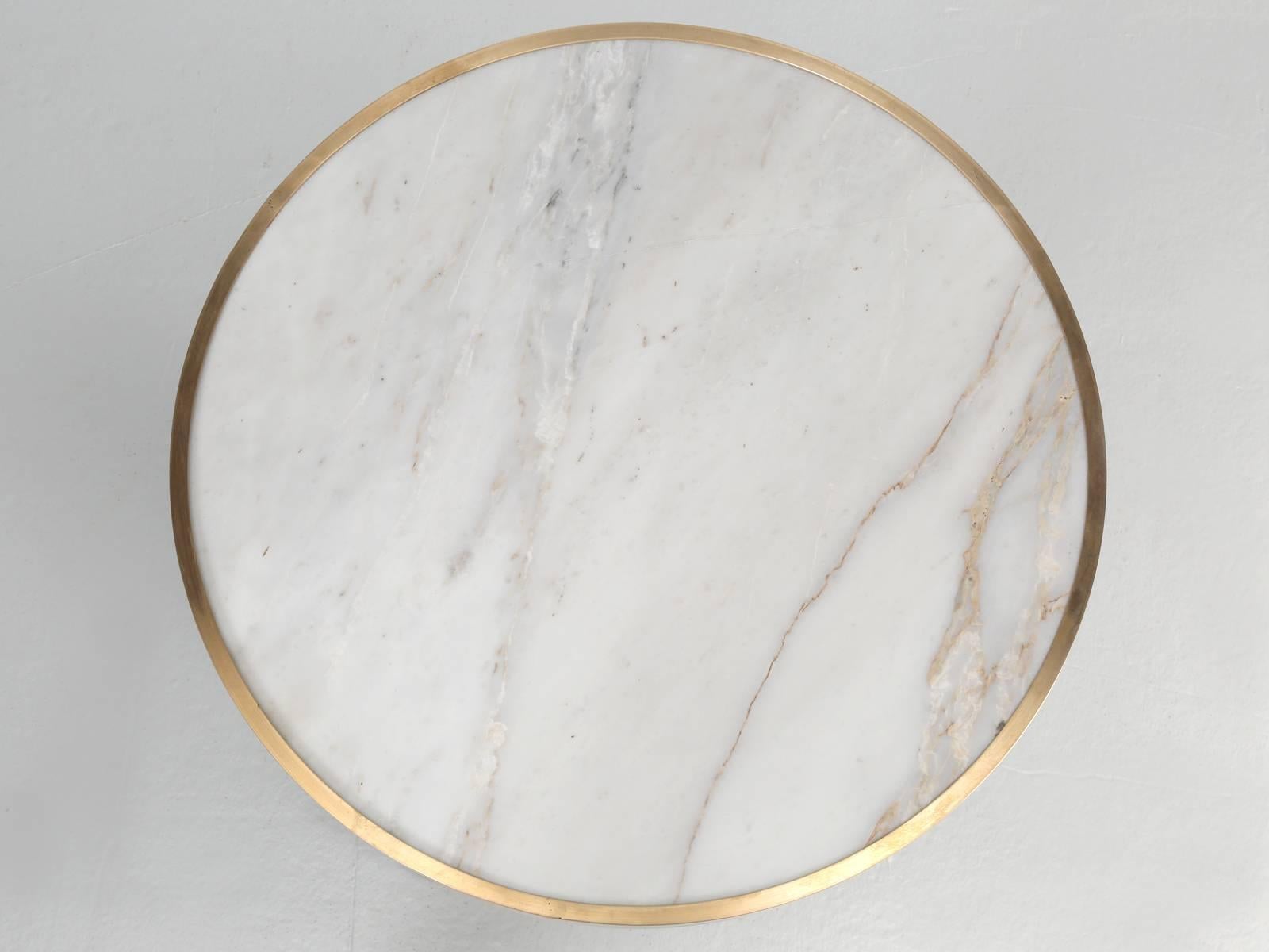 France is full of old and new bistro tables, but the best and most difficult to come by, are the nice old Carrera marble ones, with the nice brass or bronze edging.