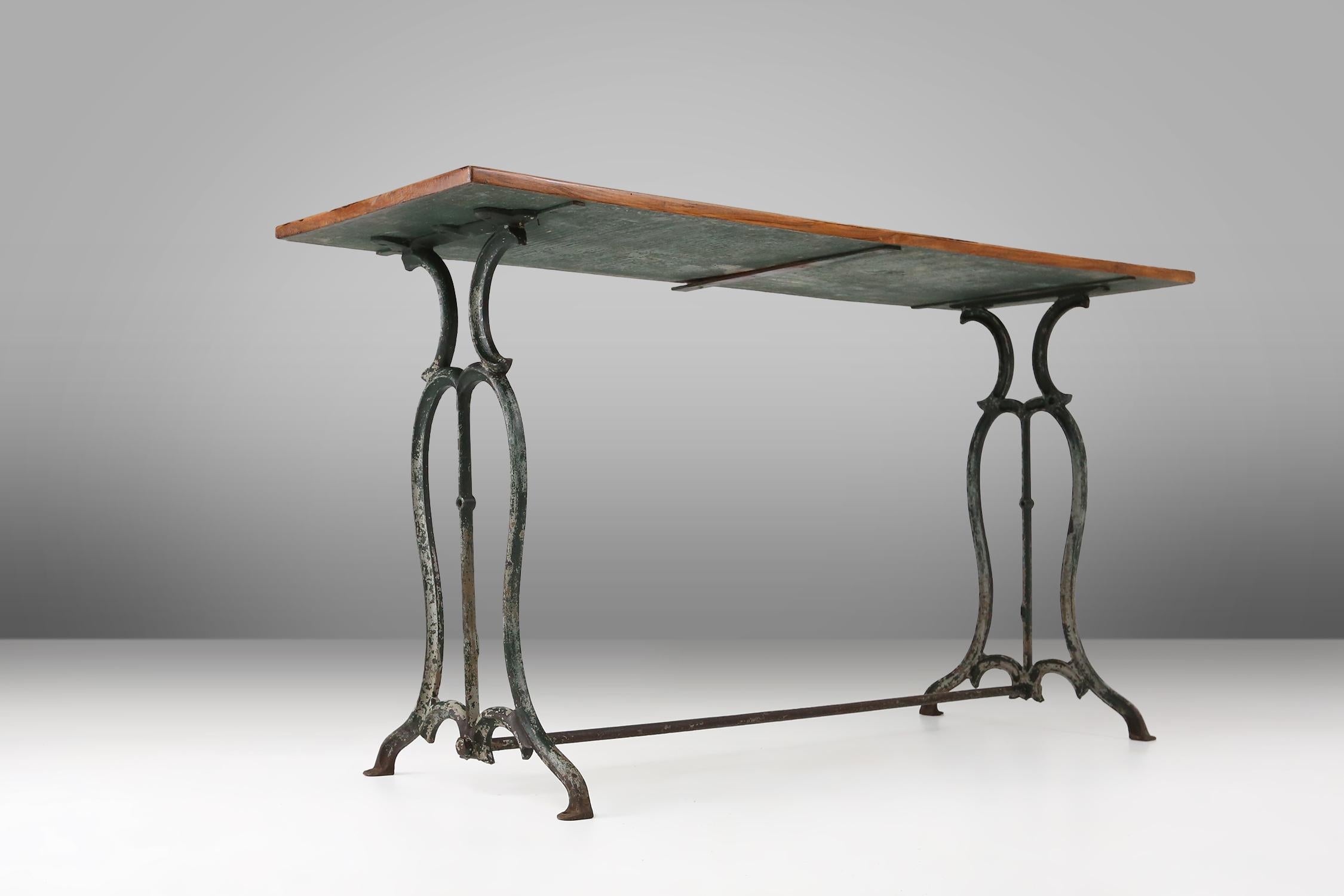 French bistro table with elegant metal base and oak top, ca. 1890 For Sale 2