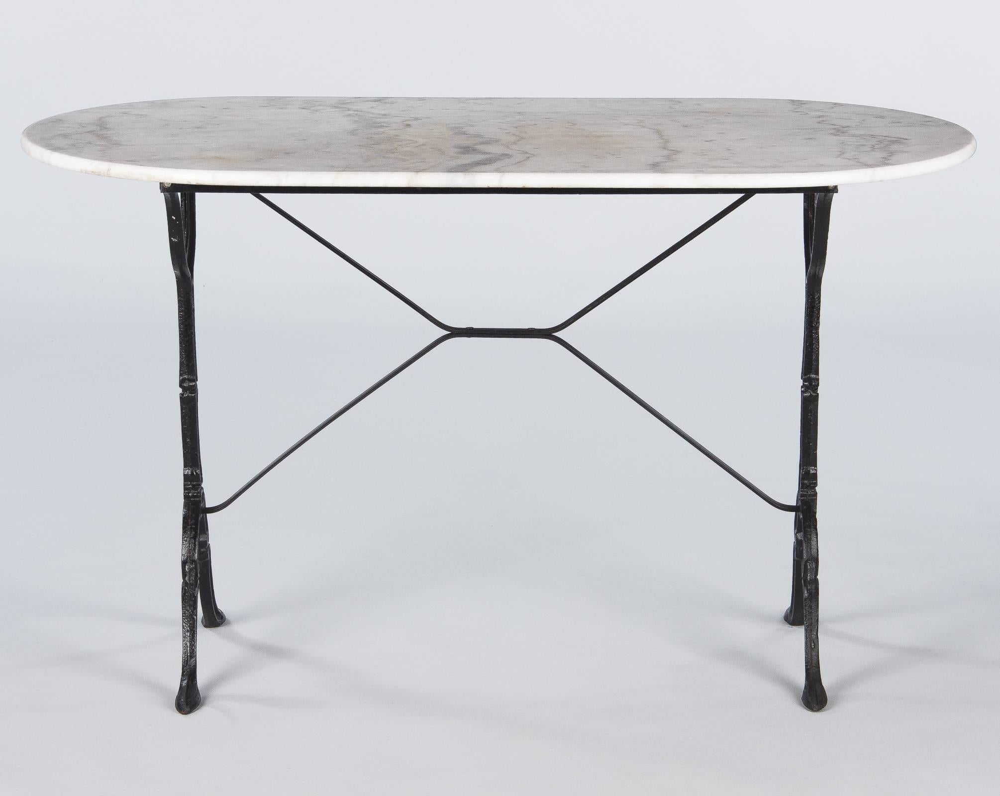 French Bistro Table with Iron Base and Oval Marble Top, 1940s In Good Condition In Austin, TX