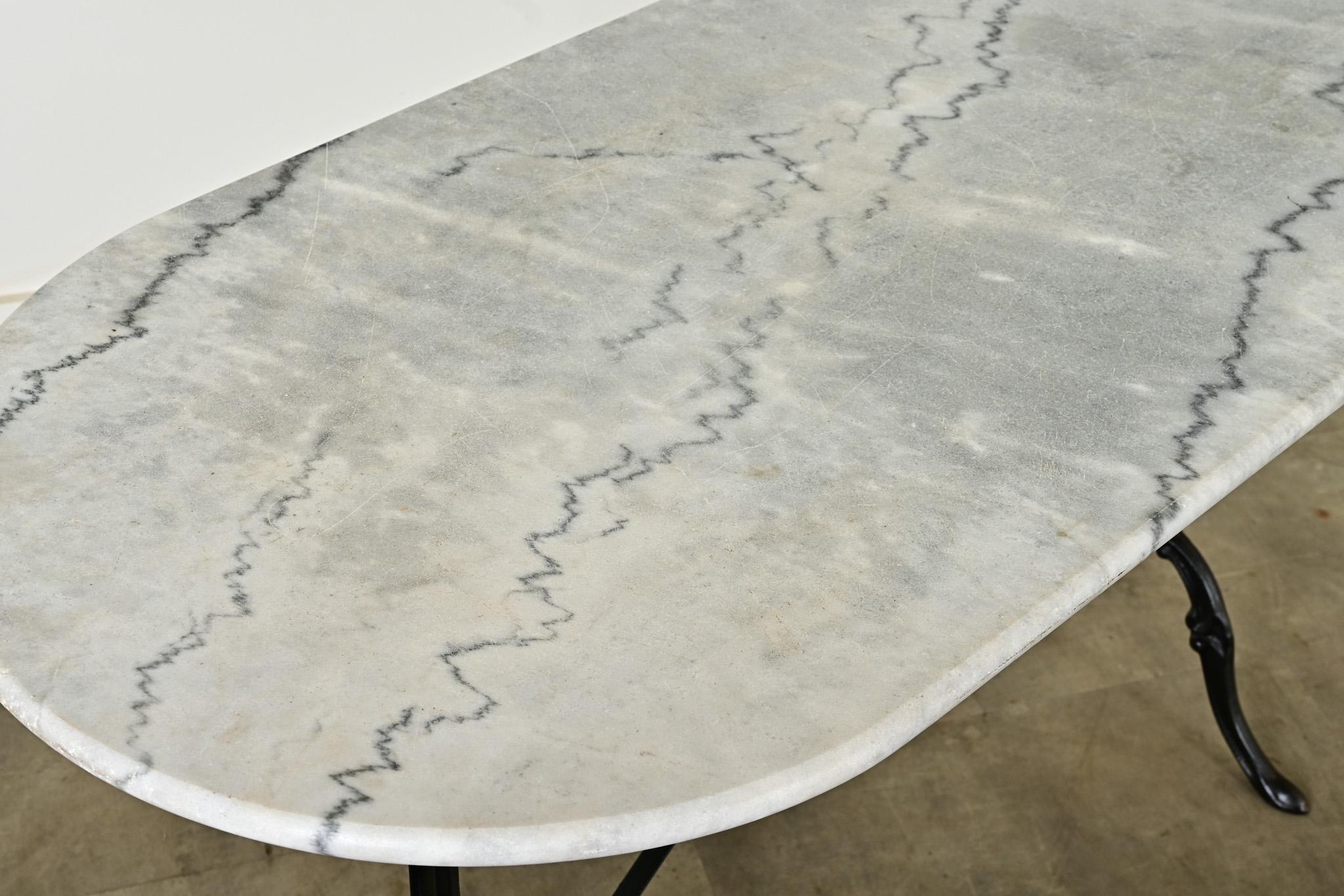 French Bistro Table with Oblong Marble Top In Good Condition In Baton Rouge, LA