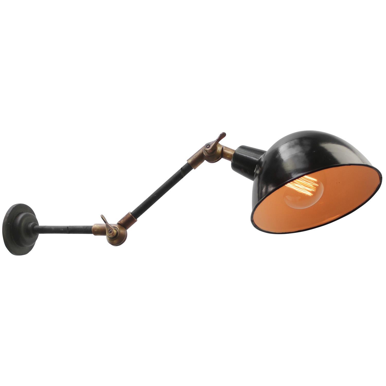 1950s Black enamel, cast iron industrial 2 arm machinist work light
adjustable in height
width as pictures: 70 cm

Diameter Wall plate 10,5 cm / 4 inches

Priced per individual item. All lamps have been made suitable by international standards for