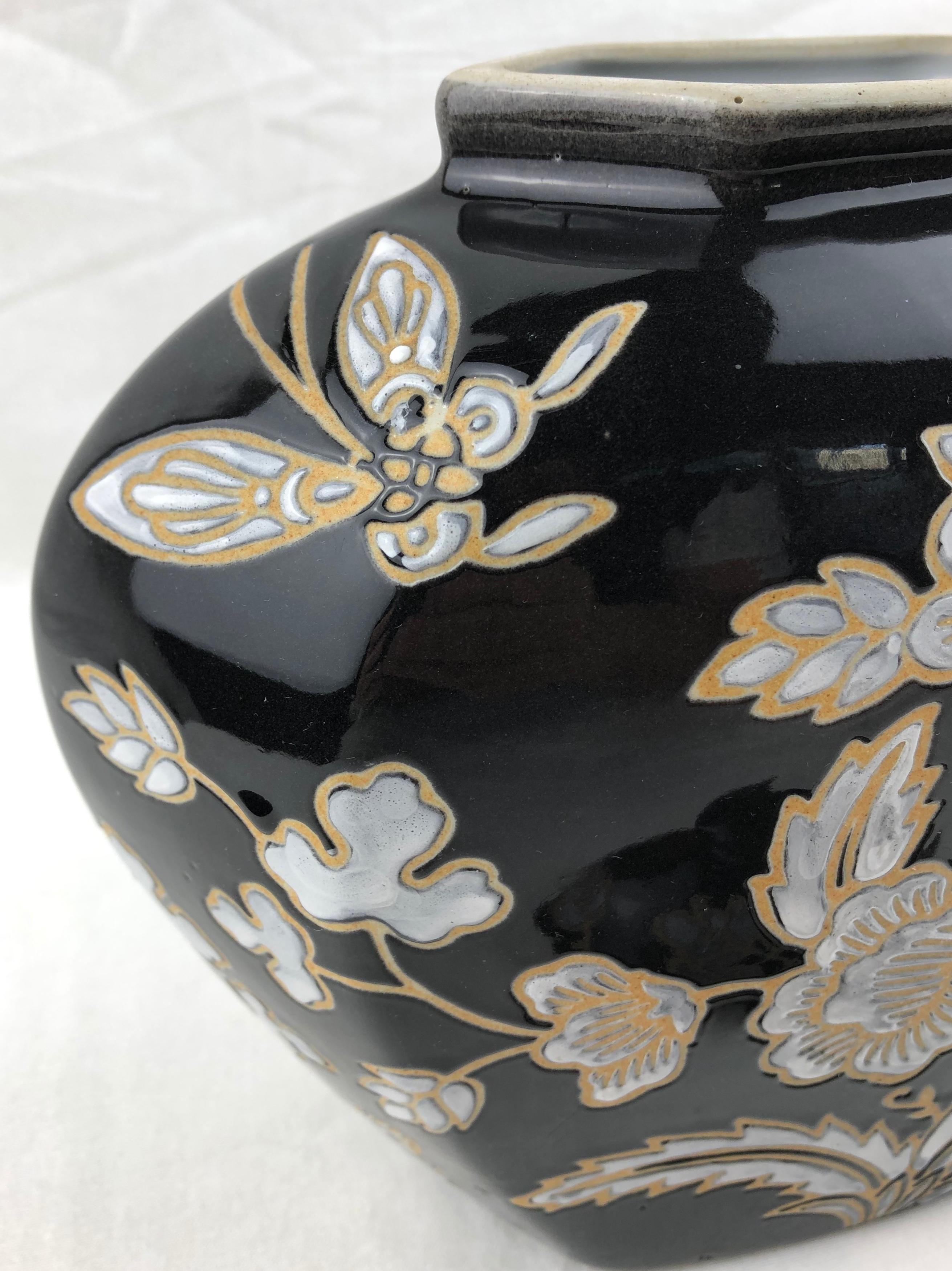 Hand-Painted French Black and Antique White Majolica Lidded Jar with Molded Floral Decor For Sale