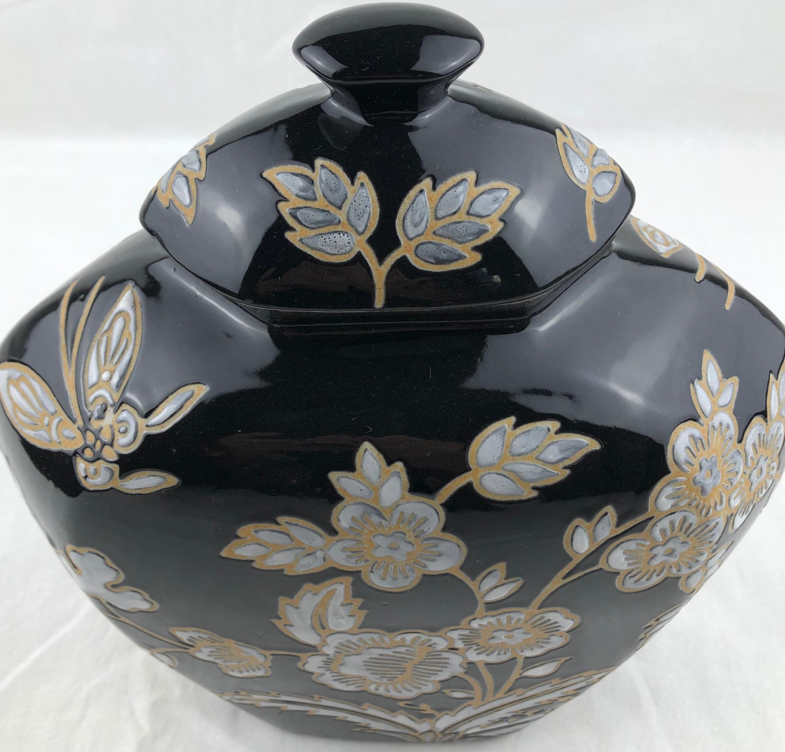 Porcelain French Black and Antique White Majolica Lidded Jar with Molded Floral Decor For Sale