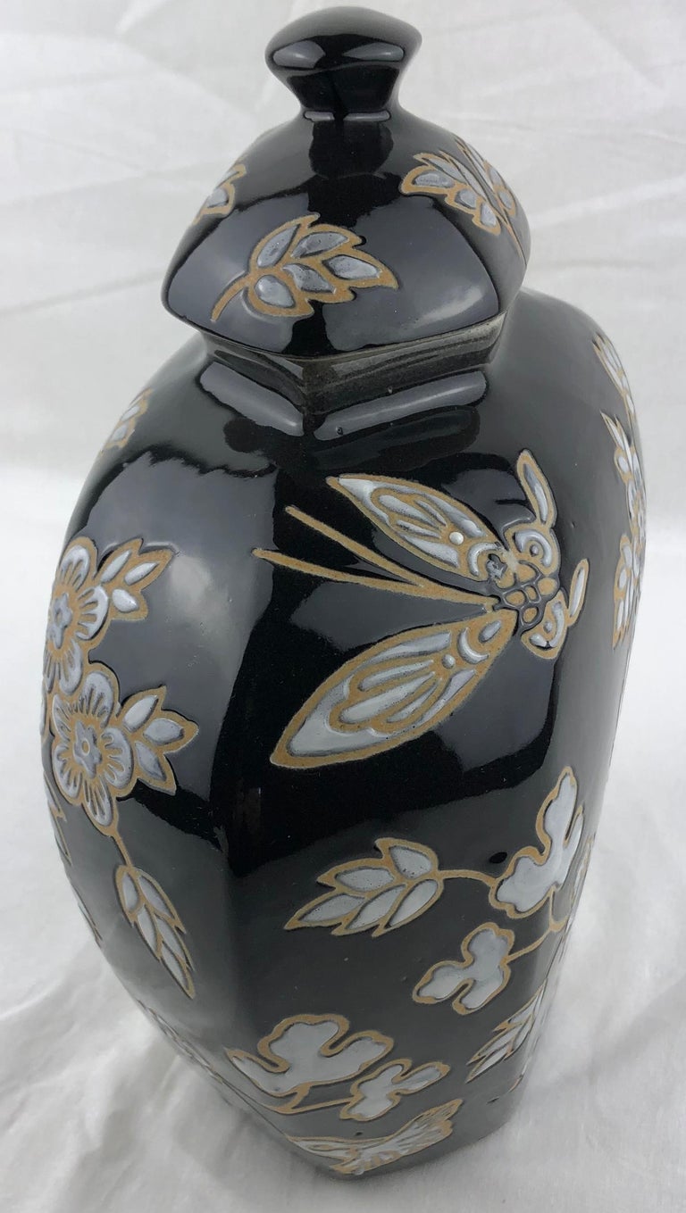 French Black and Antique White Majolica Lidded Jar with Molded Floral