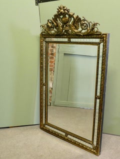 French Black and Gilt Wall Mirror, Dragons and Crest This is a striking piece