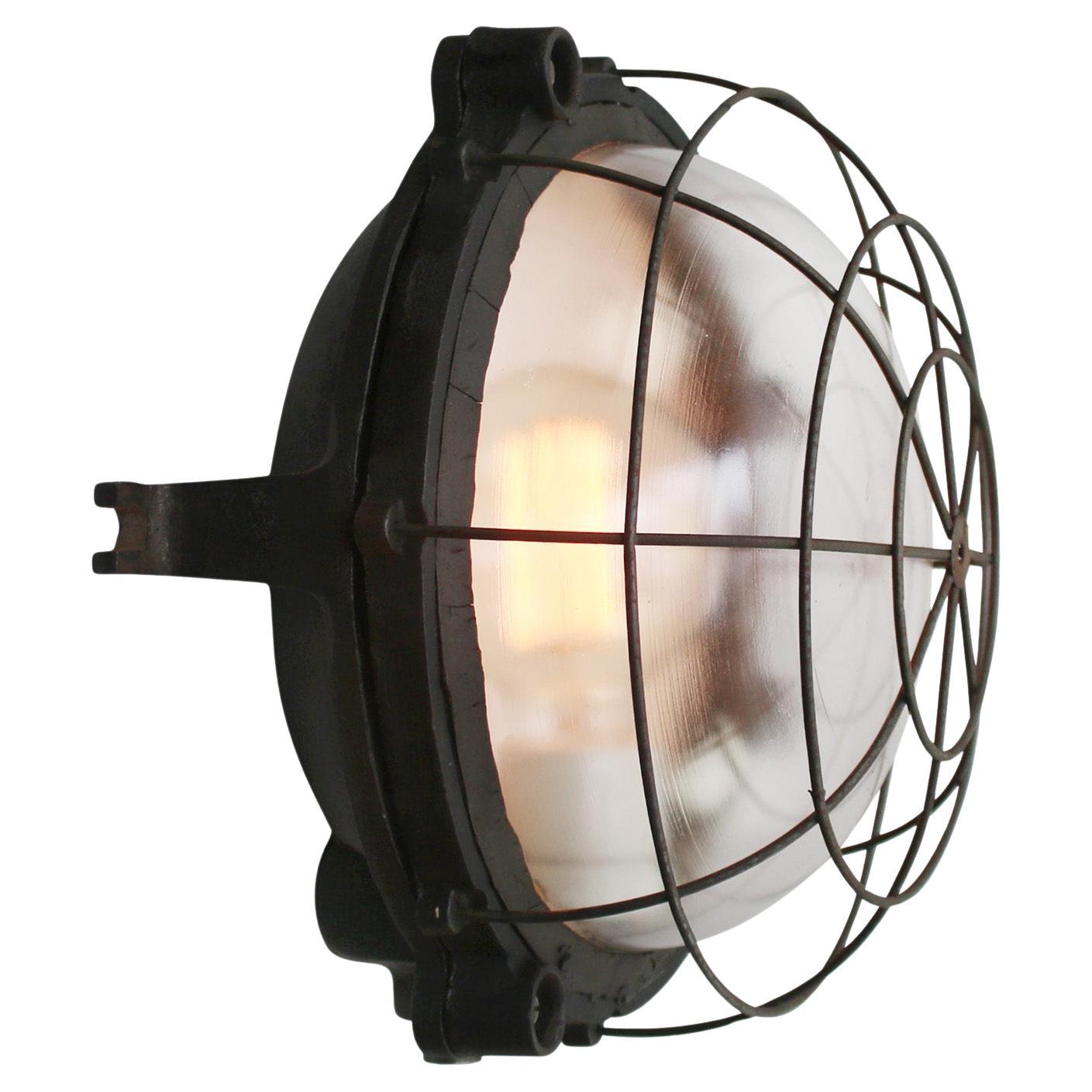 Applique in ghisa nera francese con vetro industriale d
epoca Vintage By GAL