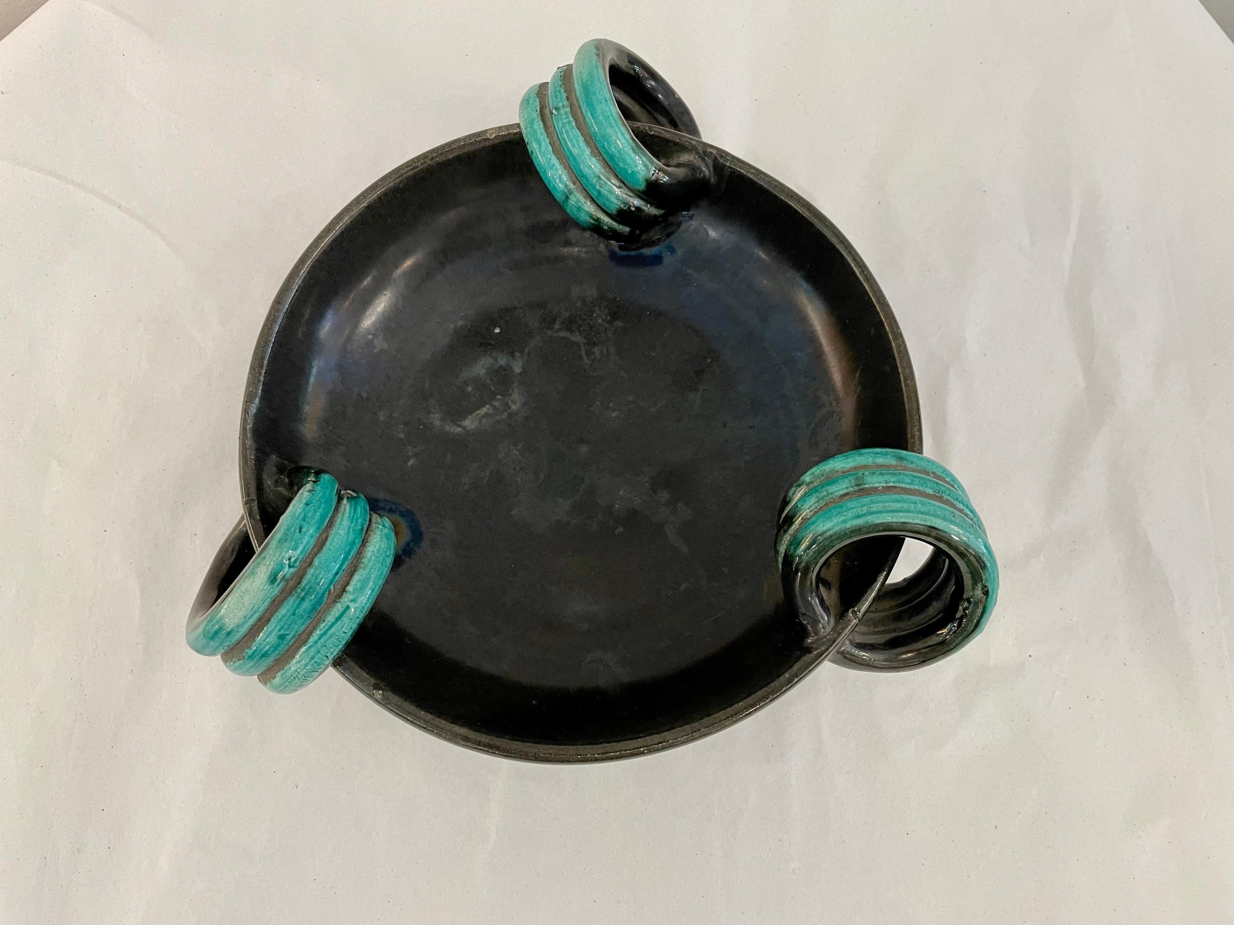One of the prettiest cache-pot bowls, dishes, we have ever had, very reminiscent of Georges Jouve. Beautiful black ceramic and vivid green ringlet details. Signed to bottom, but difficult to determine maker - acquired in France.
