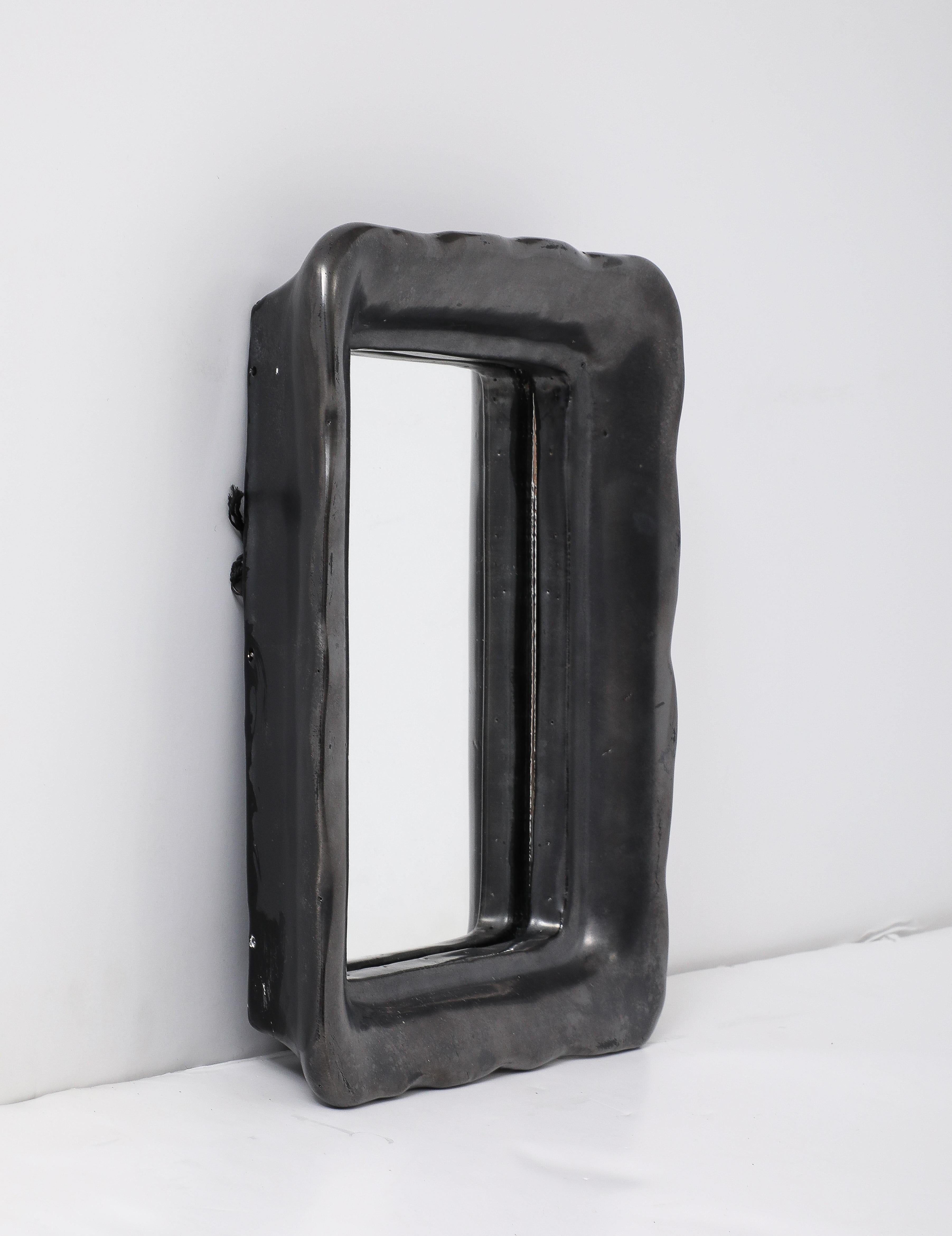 Mid-Century moderno Specchio francese in ceramica nera, stile Jouve, anni '50 in vendita