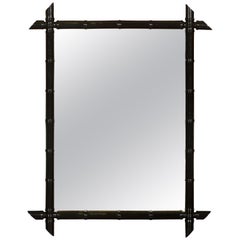 French Black Ebonized Faux Bamboo Mirror with Protruding Corners, circa 1920