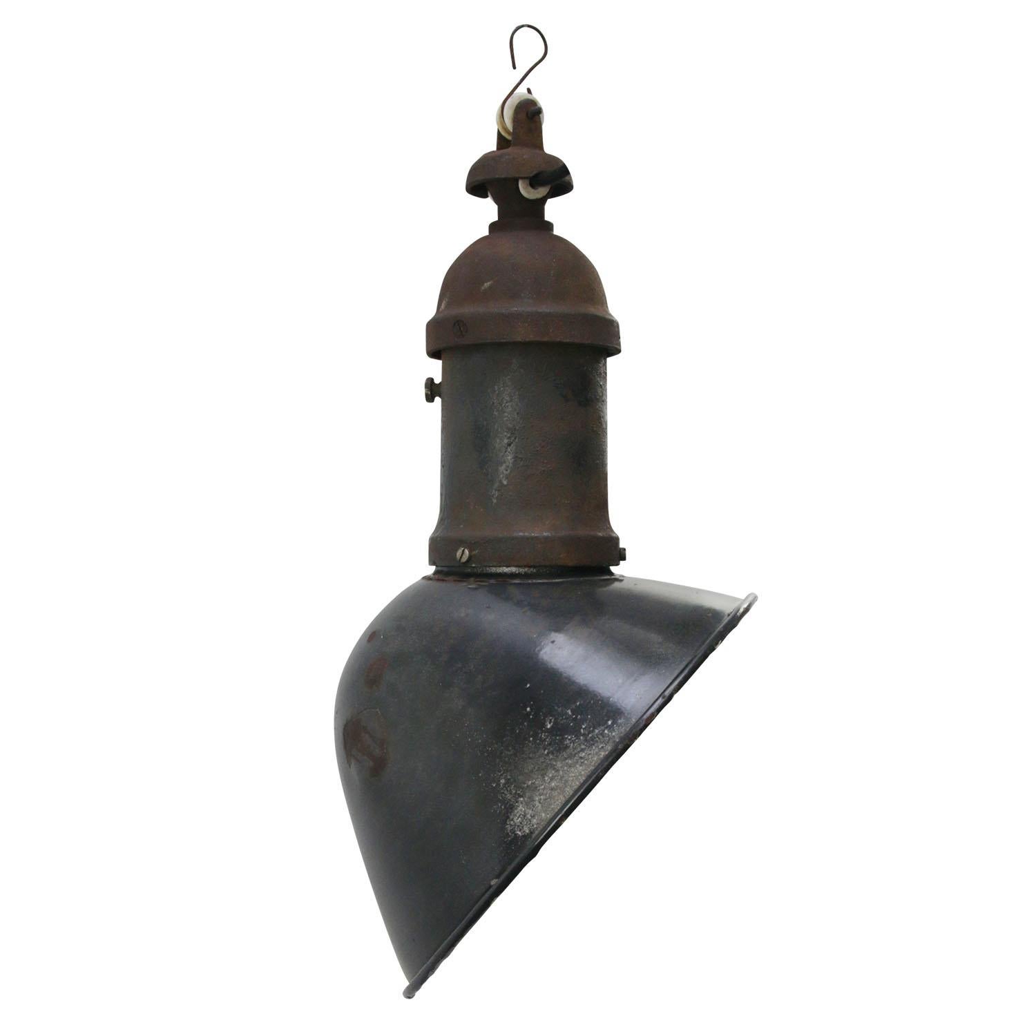 French Asymmetrical black industrial pendant
Black enamel with cast iron top
Rare model used in warehouses and factories

Weight: 3.60 kg / 7.9 lb

Priced per individual item. All lamps have been made suitable by international standards for
