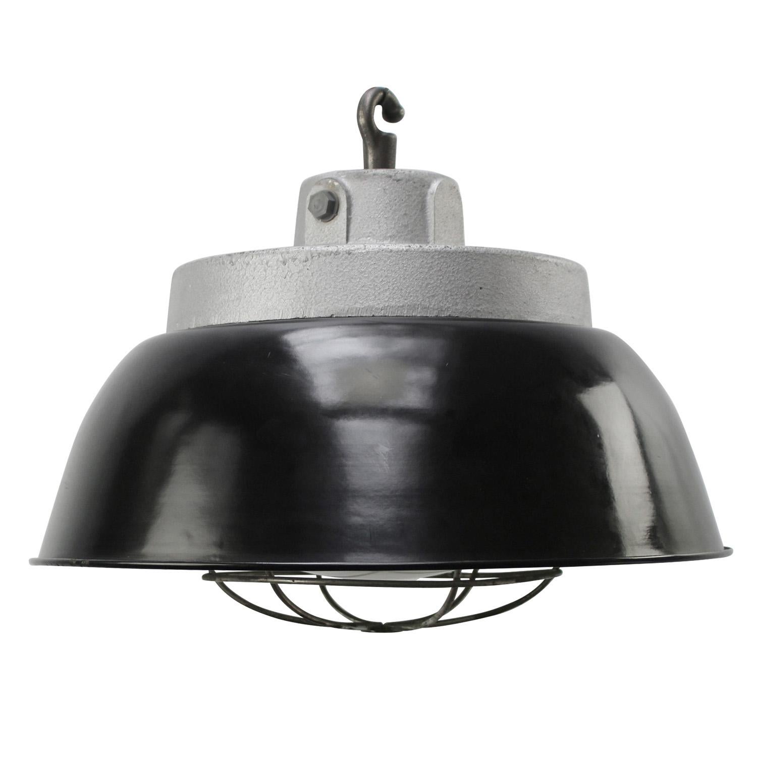 French black enamel vintage industrial pendant light
Cast iron top with clear glass and cage

Weight: 8.10 kg / 17.9 lb

Priced per individual item. All lamps have been made suitable by international standards for incandescent light bulbs,