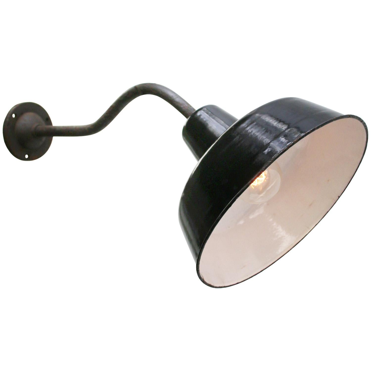 French factory wall light
black enamel, white interior

diameter cast iron wall piece: 9 cm, 2 holes to secure

Weight: 1.30 kg / 2.9 lb

Priced per individual item. All lamps have been made suitable by international standards for