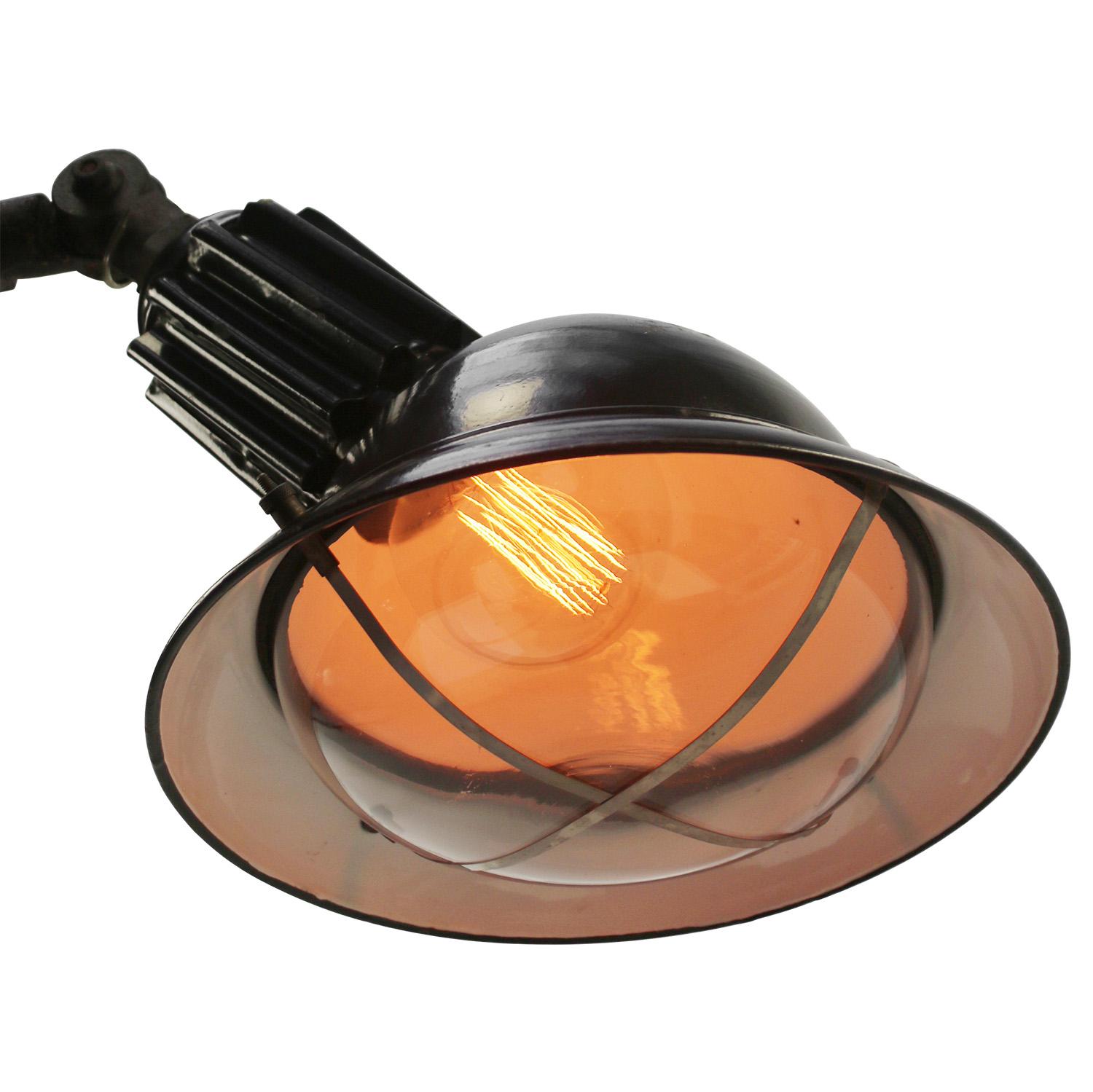 French asymmetrical black industrial wall lamp with round clear glass.
Black enamel. Rare model.

Diameter wall mount 17 cm / 6.7 inches

Weight: 7.40 kg / 16.3 lb

Priced per individual item. All lamps have been made suitable by international
