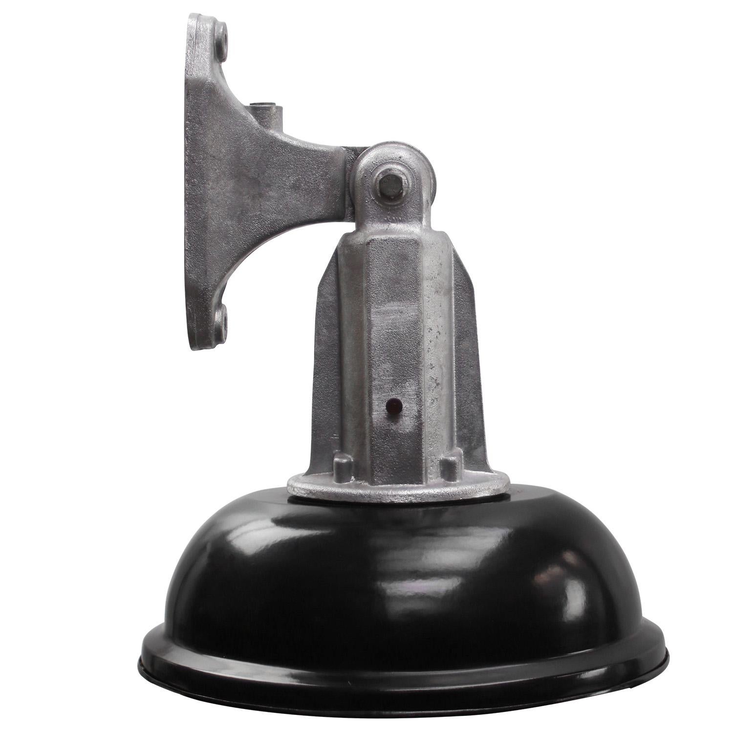 French industrial wall light.
Cast aluminium wall pieces with black enamel shade.

Size wall mount 25 × 6 cm

Weight: 3.20 kg / 7.1 lb

Priced per individual item. All lamps have been made suitable by international standards for incandescent light