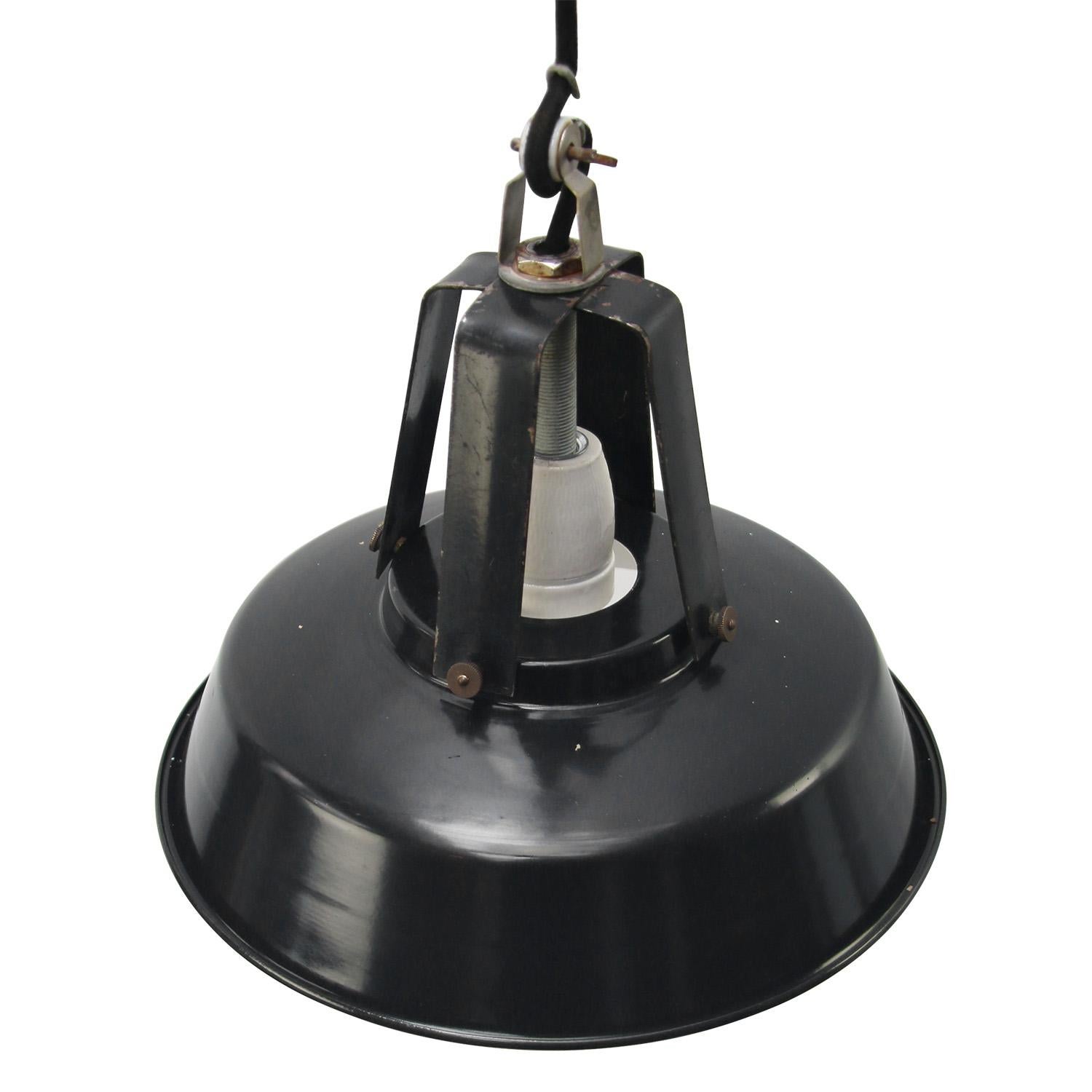 French factory light.
Black iron top with enamel shade.
White inside.

Weight: 1.00 kg / 2.2 lb

Priced per individual item. All lamps have been made suitable by international standards for incandescent light bulbs, energy-efficient and LED