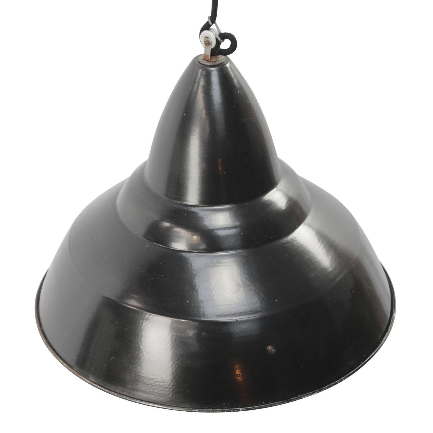 French industrial pendant lamps.
Black enamel, white inside

Weight: 1.90 kg / 4.2 lb

Priced per individual item. All lamps have been made suitable by international standards for incandescent light bulbs, energy-efficient and LED bulbs.