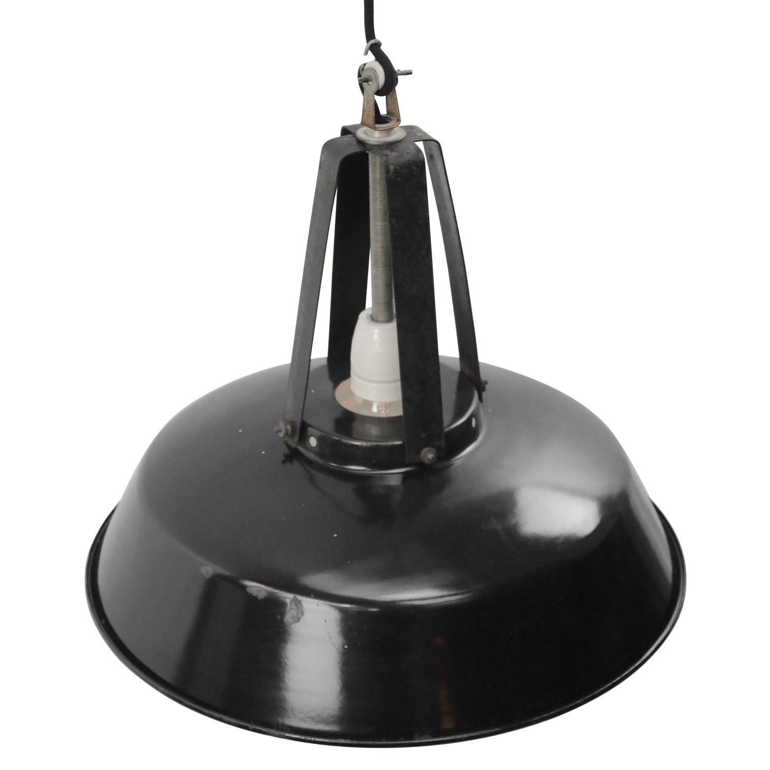 French factory light.
Black iron top with enamel shade.
White inside.

Weight: 2.00 kg / 4.4 lb

Priced per individual item. All lamps have been made suitable by international standards for incandescent light bulbs, energy-efficient and LED